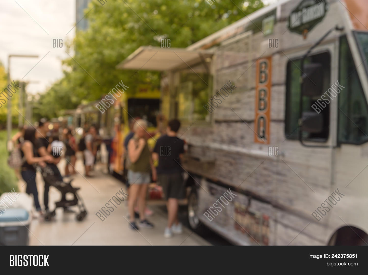 Abstract Blurred Food Truck Vendor With Customer Buy And Taste Variety Of Food 242375851 Image Stock Photo