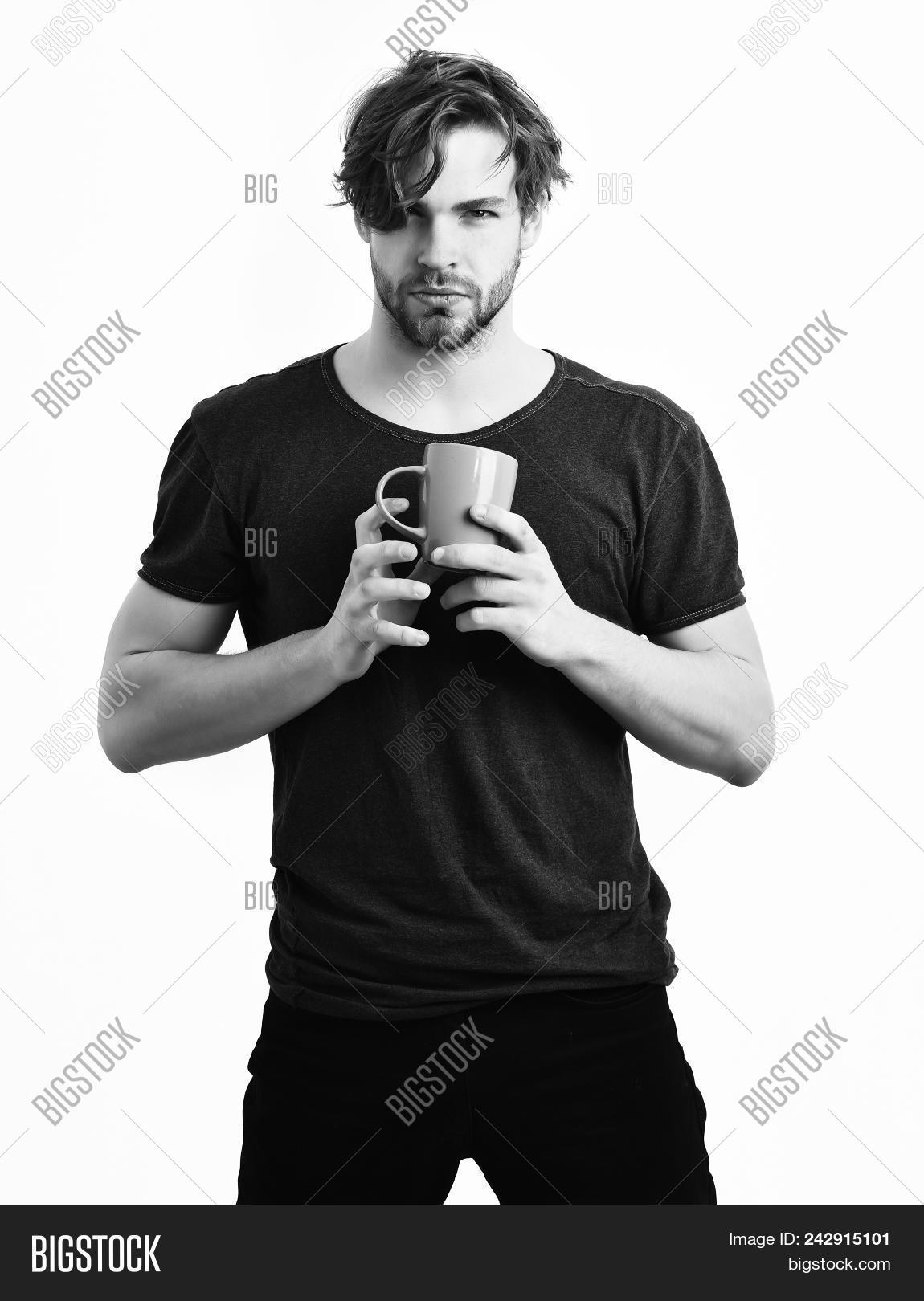 background,barbershop,beard,bearded,blue,caffeine,caucasian,coffee,cup,face,guy,hair,haircut,hairdresser,handsome,hipster,hold,holding,hot,isolated,macho,man,morning,moustache,mug,serious,sexy,shirt,short,studio,stylish,unshaven,white,young