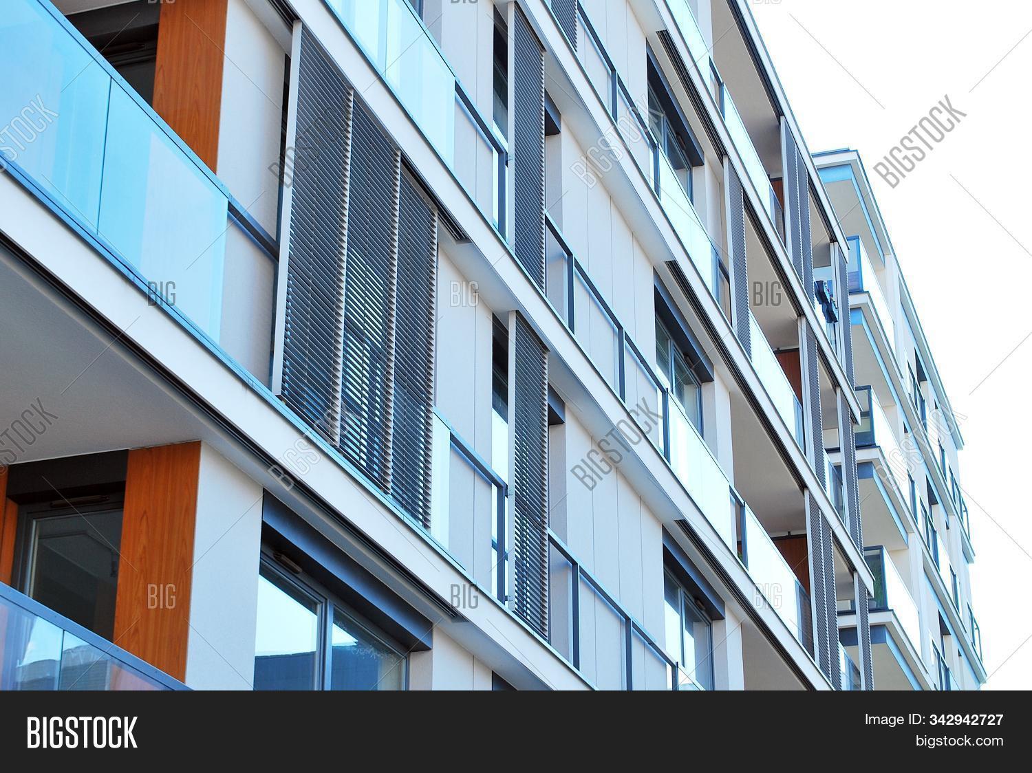 accommodation,apartment,architecture,balcony,blue,building,city,complexity,concrete,condos,construction,contemporary,day,design,detail,development,estate,europe,evening,exterior,facade,flat,futuristic,glass,high,home,house,housing,living,luxury,modern,outdoors,property,real,rental,residence,residential,scene,sky,structure,summer,tall,town,urban,window