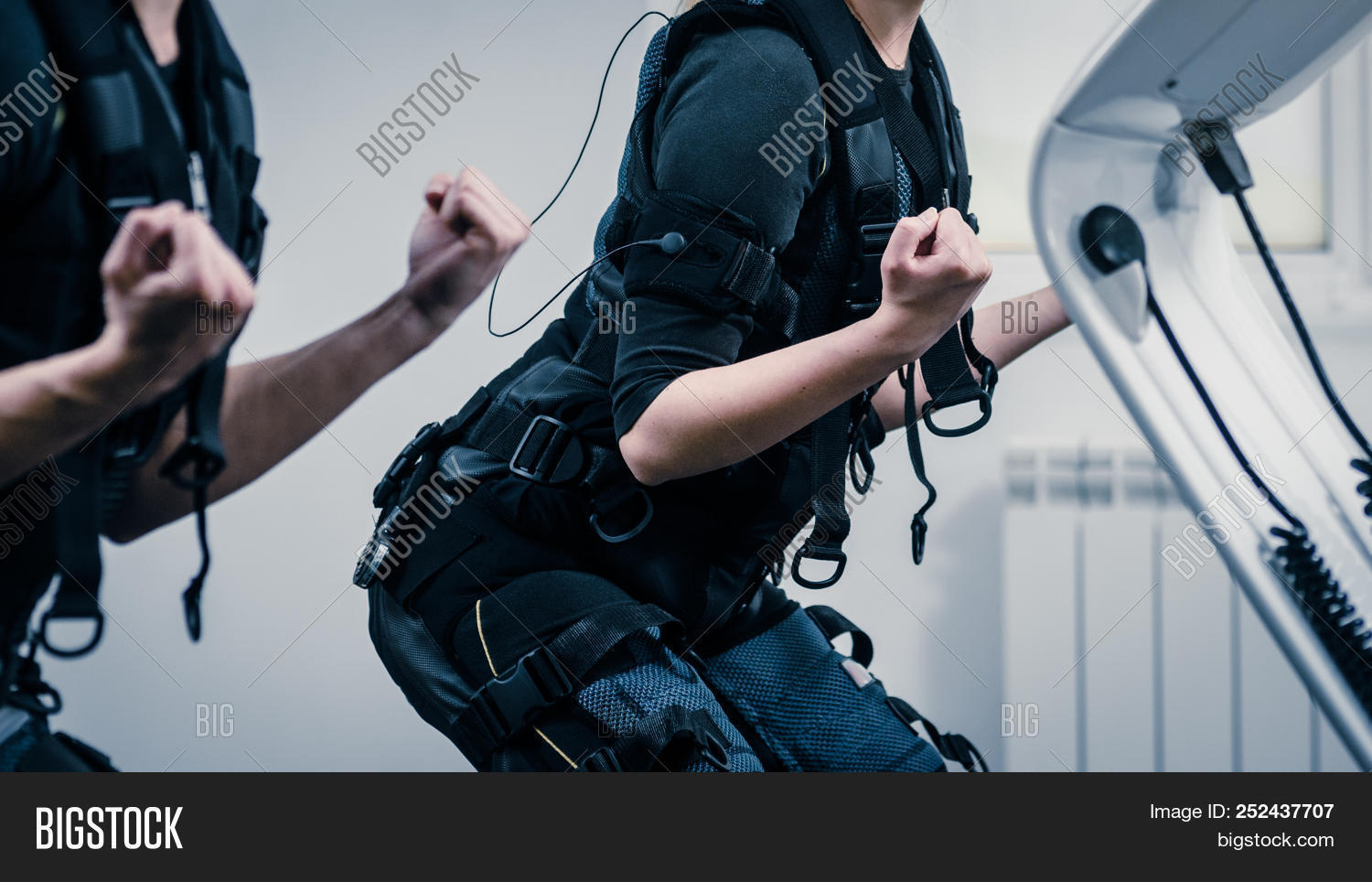 Nms Exercise Closeup O Two Women Squatting During Ems Workout At Gym image & stock ...
