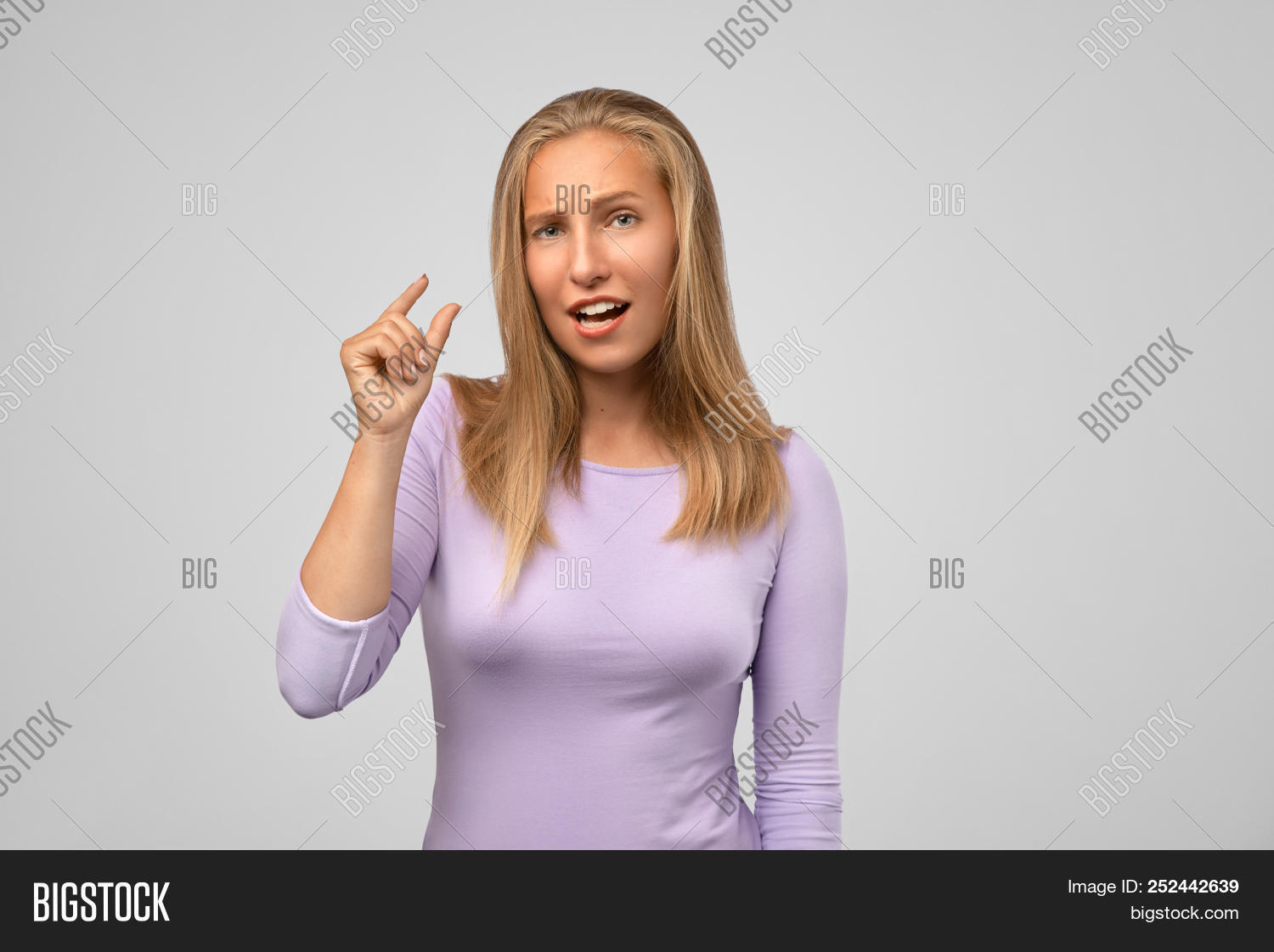 adorable,arm,background,beautiful,beauty,big,blonde,cheerful,concept,confident,cute,fashion,female,finger,gesture,gesturing,girl,hairstyle,hand,happy,isolated,large,little,lovely,measure,model,palm,people,person,pinch,portrait,pretty,scale,show,showing,sign,size,small,smile,standing,studio,symbol,teenager,thumb,tiny,unhappy,white,woman,young
