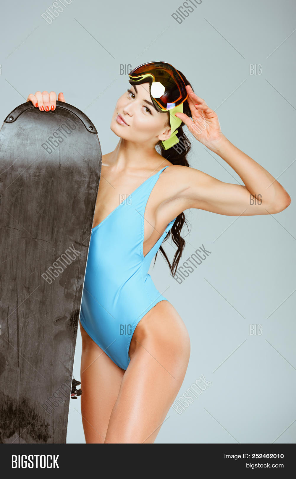 adult,alone,athletic,attractive,beautiful,blue,brunette,caucasian,female,girl,glasses,goggles,leotard,passionate,people,person,seductive,sensual,sensuality,sexy,shot,ski,snowboard,snowboarder,sport,sportive,sportswear,sportswoman,sporty,standing,studio,swimsuit,swimwear,woman