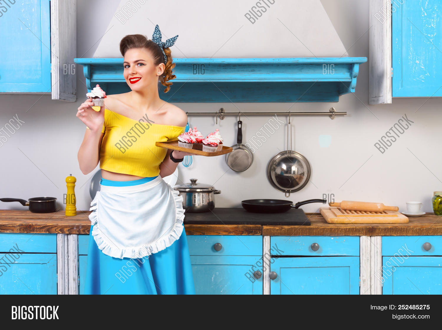 50s,60s,apron,attractive,background,baking,blue,cabinet,café,caucasian,colorful,cook,cooking,culinary,cupcakes,dessert,diet,domestic,female,food,funny,girl,glamour,hairband,hairstyle,home,house,housewife,kitchen,kitchenware,lady,lipstick,pan,pin,preparation,red,retro,service,skirt,smile,sweet,top,tray,up,utensils,vintage,white,wife,woman,yellow