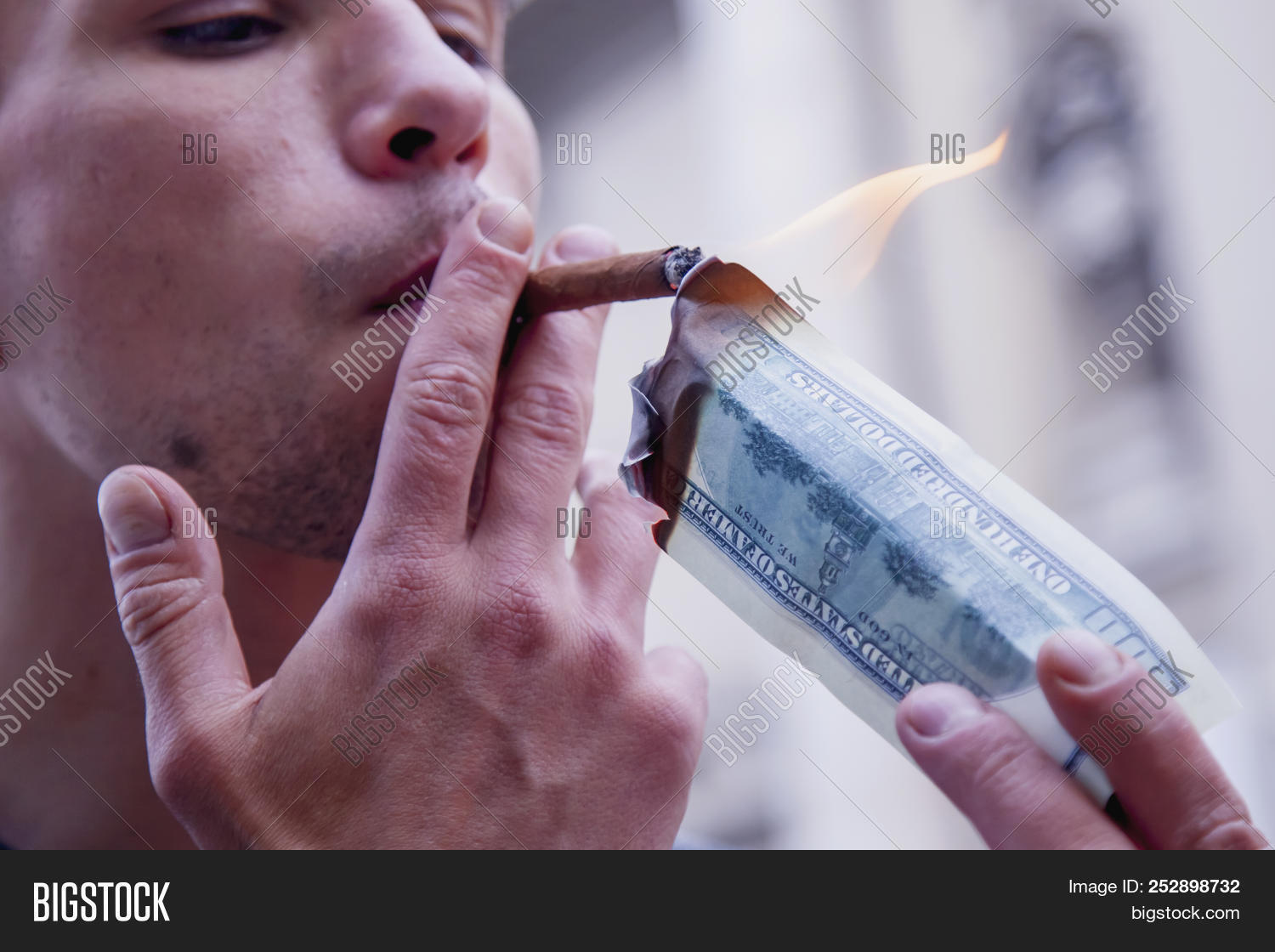 adult,arrogant,bank,banker,banking,banknote,benjamin,bill,boss,business,businessman,businesspeople,cigar,concept,currency,dark,dollar,economy,finance,fire,flame,greed,greedy,indulgence,lighting,luxury,male,man,money,note,one,people,person,rich,smoke,smoker,wealth,young