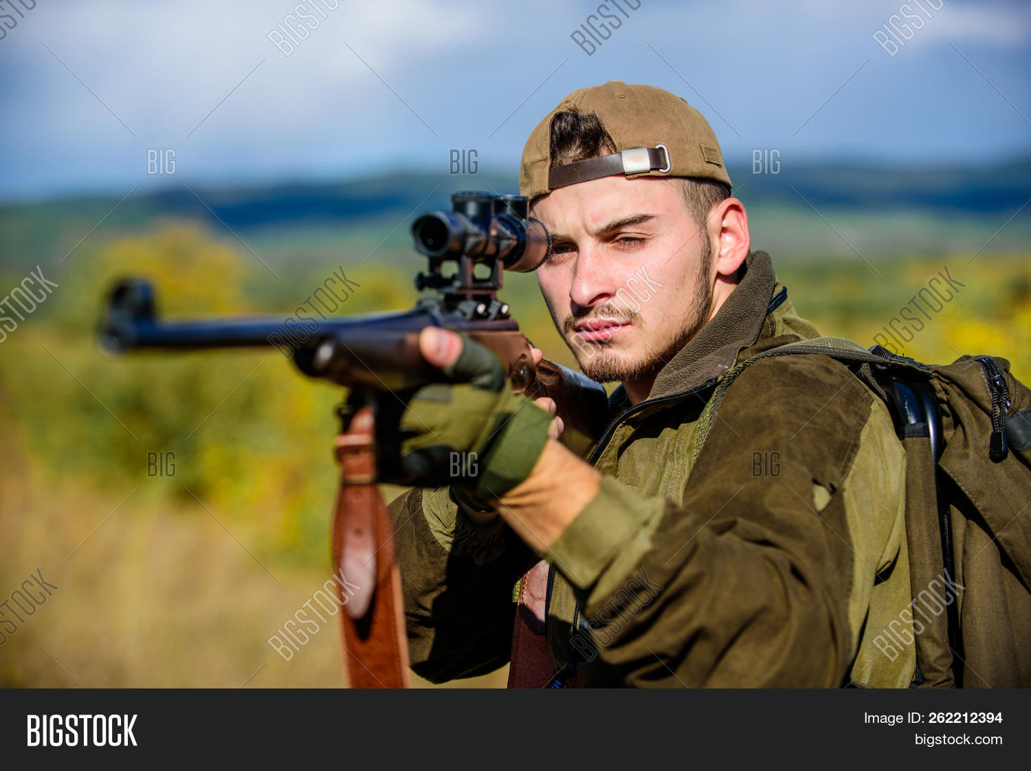 adult,aim,aiming,ammunition,attack,background,beard,bearded,brutal,caucasian,concentrated,concept,confident,environment,equipment,focused,gamekeeper,gun,guy,hat,hunt,hunter,hunting,huntsman,leisure,look,looking,man,masculinity,nature,observe,ready,rifle,scope,see,serious,shoot,shot,shotgun,skill,sniper,strict,target,through,weapon,wear,woodsman