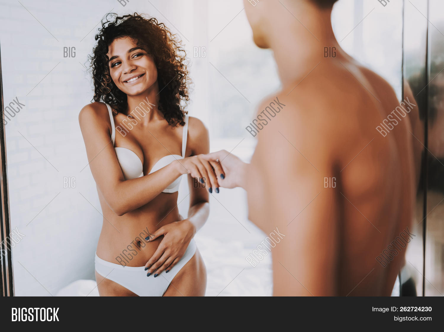 adult,attractive,bed,bedroom,bra,casual,caucasian,concept,couple,desire,embrace,erotic,foreplay,fun,girl,girlfriend,handsome,happy,home,husband,intimacy,intimate,lady,leisure,lifestyle,lingerie,love,lovers,male,man,passion,people,person,relationship,romance,romantic,sensual,sex,sexual,sexy,smile,smiling,stand,together,touching,underwear,white,woman,young