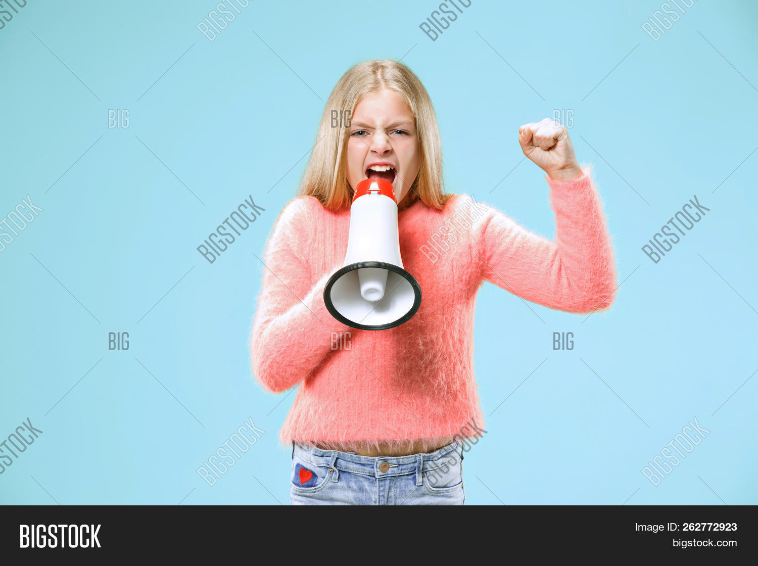 announce,announcement,attention,attractive,beautiful,blue,bullhorn,casual,caucasian,child,communicate,communication,cute,education,fan,female,fun,girl,holding,isolated,loud,loudspeaker,lovely,megaphone,message,model,news,people,person,portrait,pretty,proclaim,school,scream,screaming,shout,shouting,sound,speak,speaker,speaking,speech,studio,success,teen,voice,woman,yell,yelling,young