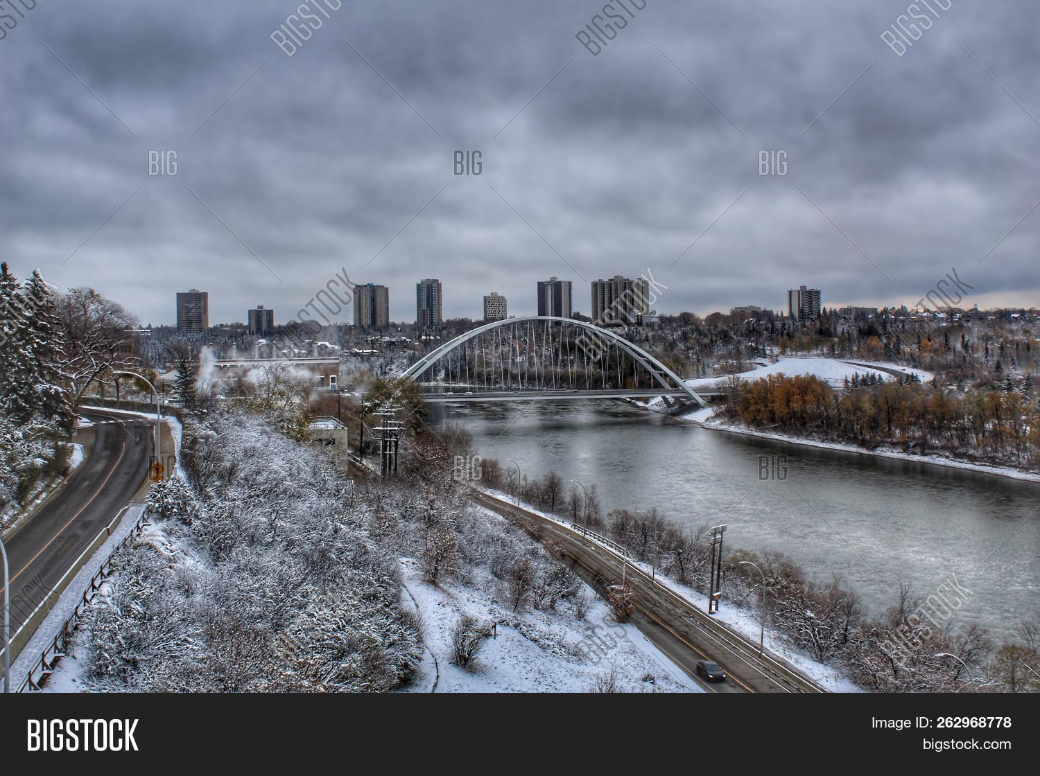 alberta,bridge,canada,clouds,dark,downtown,edmonton,gloomy,landscape,outdoors,panorama,panoramic,river,road,snow,urban