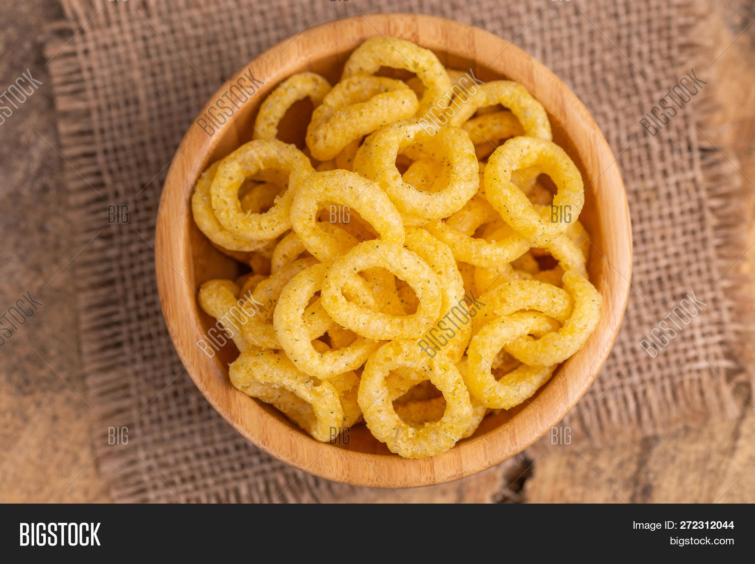 appetizer,background,balls,beverage,bowl,cereal,cheese,chips,cholesterol,cinema,corn,cornmeal,crisp,crispy,crunchy,cuisine,delicious,dry,entertainment,fast,fat,fattening,flavor,food,fried,full,golden,heap,junk,meal,movie,nobody,obesity,orange,pop,puff,puffed,rings,round,salty,snack,spicy,studio,tasty,theater,trans,unhealthy,wheat,wooden,yellow