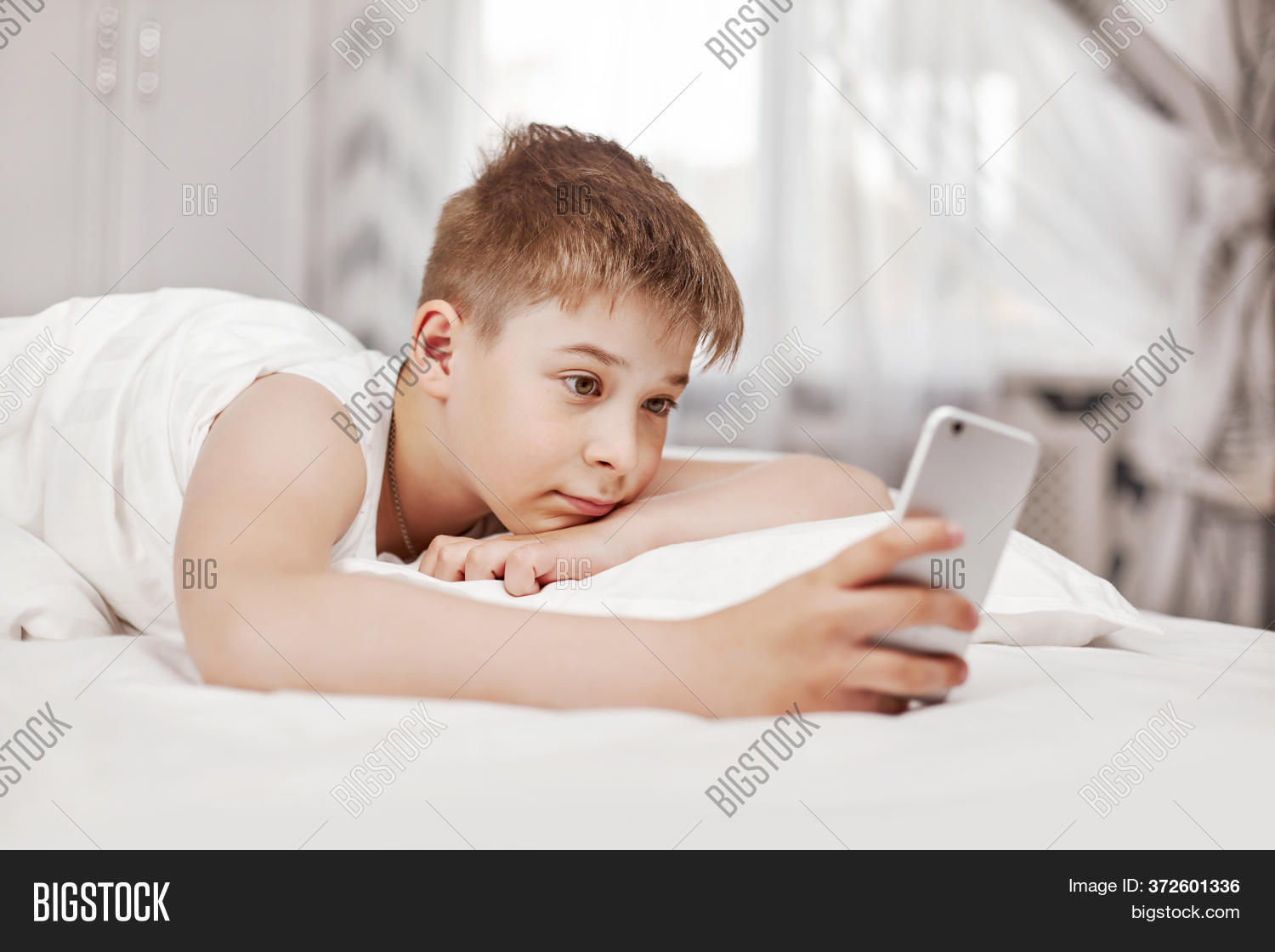 boy, 																					bed, 																					phone, 																					hair, 																					indoors, 																					bedroom, 																					home, 																					kid, 																					room, 																					portrait, 																					person, 																					internet, 																					interior, 																					technology, 																					child, 																					people, 																					happy, 																					family, 																					bedding, 																					young, 																					cute, 																					message, 																					horizontal, 																					holding, 																					teenager, 																					enjoyment, 																					mobile, 																					online, 																					communication, 																					smartphone, 																					lifestyle, 																					happiness, 																					adorable, 																					care, 																					attractive, 																					looking, 																					face, 																					healthy, 																					pretty, 																					touch, 																					teenage, 																					messaging