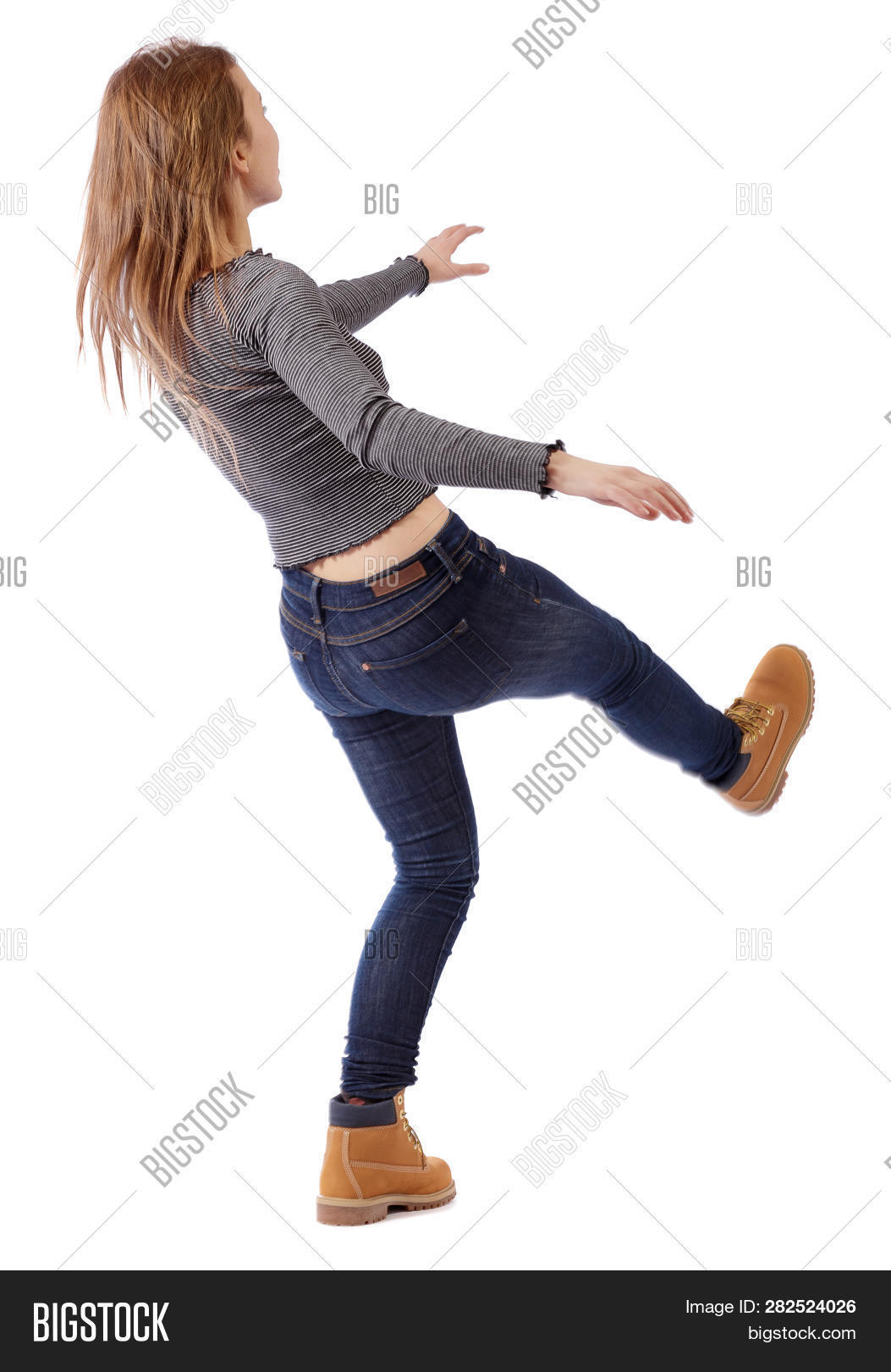 adult,back,background,backside,balance,behind,businessman,career,caucasian,concentrated,consider,emotion,expectation,female,human,isolated,looking,matrix,one,only,people,person,posing,professional,rear,sight,soar,standing,student,studio,stumble,uncertainty,unsteady,view,watching,well-dressed,white,women,young