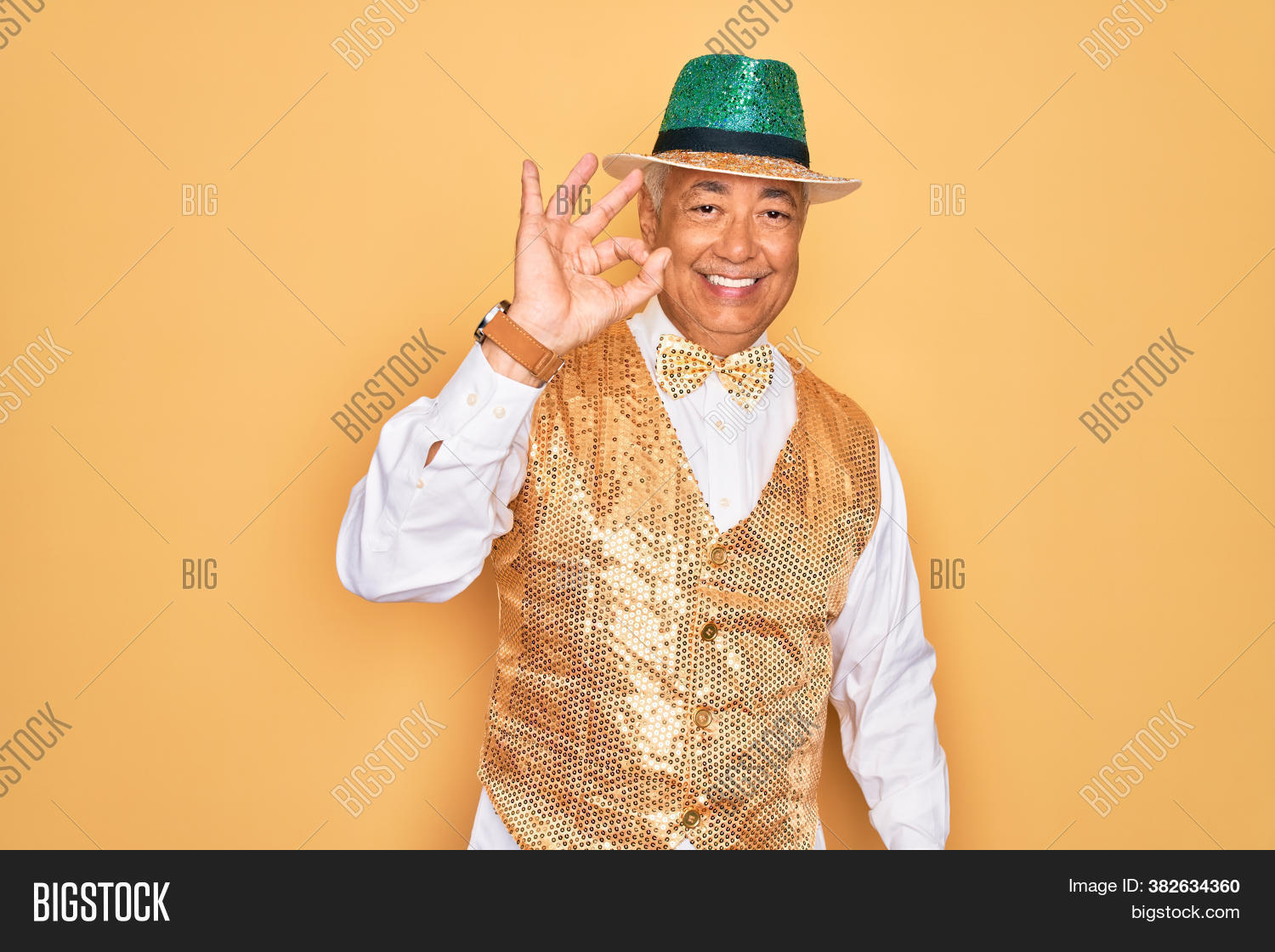 adult, 																					agree, 																					approve, 																					background, 																					brazil, 																					brazilian, 																					carnaval, 																					carnival, 																					celebration, 																					cheerful, 																					colorful, 																					confident, 																					costume, 																					doing, 																					expression, 																					face, 																					festival, 																					finger, 																					fingers, 																					friendly, 																					fun, 																					gesture, 																					good, 																					great, 																					grey-haired, 																					hand, 																					happiness, 																					isolated, 																					latin, 																					looking, 																					man, 																					middle age, 																					natural, 																					ok, 																					okay, 																					old, 																					party, 																					people, 																					person, 																					portrait, 																					positive, 																					senior, 																					showing, 																					sign, 																					smile, 																					success, 																					successful, 																					yellow, 																					yes