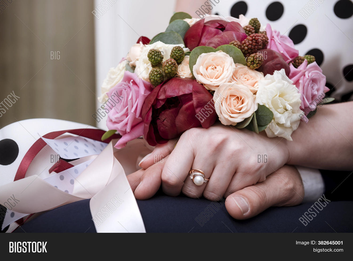 wedding, 																					bouquet, 																					flower, 																					ring, 																					groom, 																					love, 																					woman, 																					hand, 																					maroon, 																					white, 																					rose, 																					couple, 																					celebration, 																					bride, 																					marriage, 																					romance, 																					beautiful, 																					floral, 																					detail, 																					man, 																					together, 																					bridal, 																					people, 																					elegance, 																					married, 																					husband, 																					ceremony, 																					family, 																					happy, 																					togetherness, 																					wife, 																					closeup, 																					event, 																					engagement, 																					beauty, 																					gown, 																					female, 																					happiness, 																					romantic, 																					newlywed, 																					upper, 																					greeting, 																					commit, 																					band, 																					partnership
