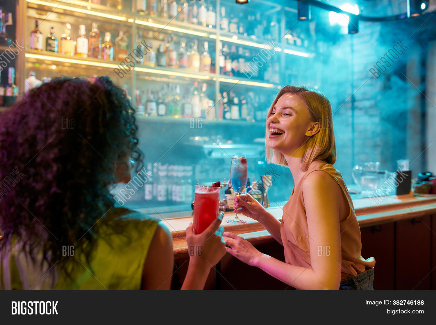 bar, 																					pub, 																					people, 																					women, 																					interior, 																					night, 																					drink, 																					background, 																					nightclub, 																					clubbing, 																					counter, 																					fun, 																					inside, 																					two, 																					adults, 																					alcohol, 																					best, 																					beverage, 																					caucasian, 																					cheerful, 																					club, 																					enjoying, 																					enjoyment, 																					friends, 																					friendship, 																					happy, 																					horizontal, 																					indoors, 																					looking, 																					nightlife, 																					partying, 																					smiling, 																					togetherness, 																					young, 																					female, 																					clinking, 																					toasting, 																					cocktails, 																					drinking, 																					alcoholic, 																					laughing