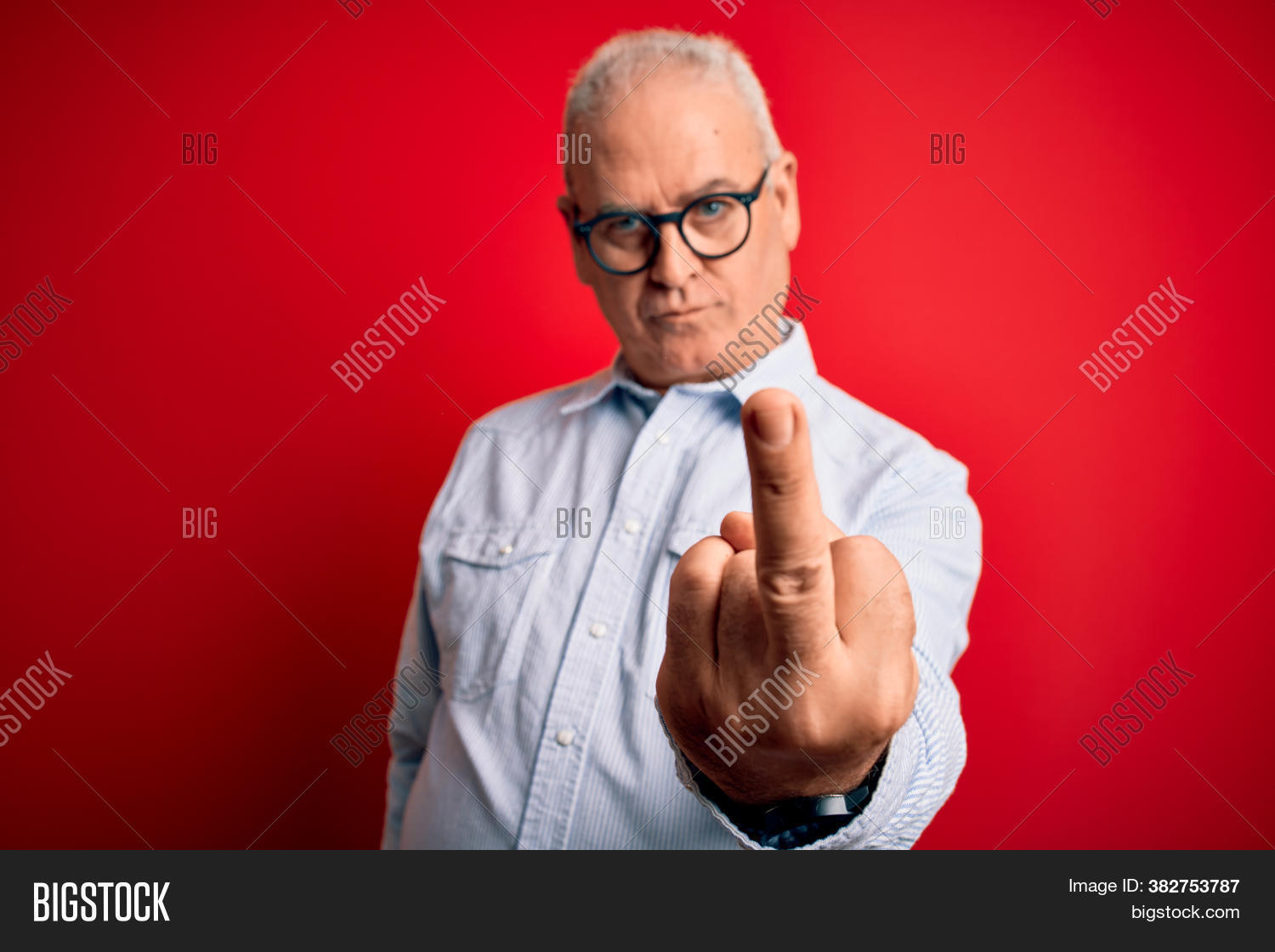adult, 																					angry, 																					attitude, 																					background, 																					bad, 																					casual, 																					caucasian, 																					concept, 																					crazy, 																					expression, 																					face, 																					fashion, 																					finger, 																					fingers, 																					funny, 																					gesture, 																					gesturing, 																					glasses, 																					hand, 																					hands, 																					handsome, 																					hoary, 																					impolite, 																					isolated, 																					male, 																					man, 																					middle, 																					middle age, 																					model, 																					naughty, 																					off, 																					old, 																					people, 																					person, 																					portrait, 																					provocation, 																					red, 																					rude, 																					senior, 																					shirt, 																					show, 																					showing, 																					sign, 																					standing, 																					stop, 																					striped, 																					summer, 																					symbol, 																					you