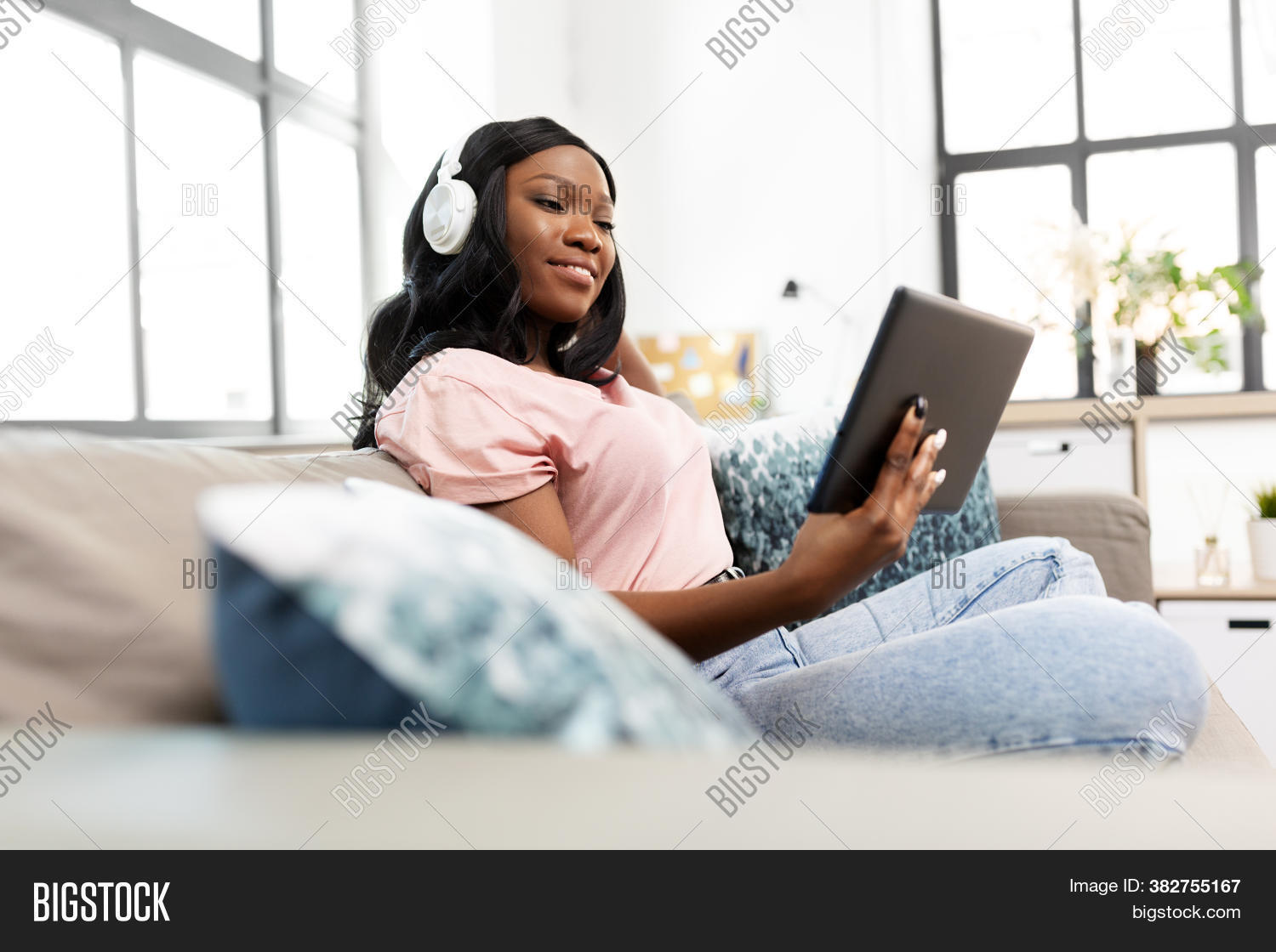 adult, 																					african, 																					african american, 																					app, 																					application, 																					audio, 																					beautiful, 																					black, 																					browsing, 																					communication, 																					computer, 																					concept, 																					connection, 																					earphones, 																					female, 																					gadget, 																					happy, 																					headphones, 																					home, 																					indoors, 																					internet, 																					leisure, 																					lifestyle, 																					listening, 																					living room, 																					music, 																					networking, 																					online, 																					pc, 																					people, 																					person, 																					playlist, 																					podcast, 																					radio, 																					reading, 																					smiling, 																					social networking, 																					sofa, 																					tablet, 																					technology, 																					tune, 																					woman, 																					young