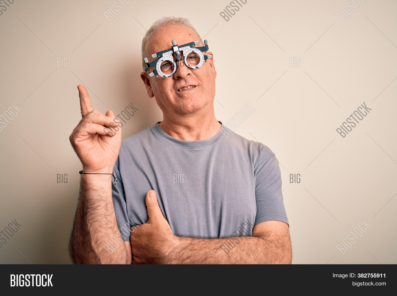 advertisement, 																					arm, 																					background, 																					big, 																					camera, 																					caucasian, 																					cheerful, 																					confident, 																					emotion, 																					expression, 																					eye, 																					eyesight, 																					eyewear, 																					face, 																					finger, 																					fingers, 																					gesture, 																					glasses, 																					hand, 																					happy, 																					hoary, 																					isolated, 																					laugh, 																					looking, 																					man, 																					middle age, 																					myopia, 																					old, 																					open mouth, 																					optical, 																					optometry, 																					person, 																					point, 																					pointing, 																					portrait, 																					presenting, 																					product, 																					professional, 																					senior, 																					showing, 																					side, 																					sign, 																					smile, 																					smiling, 																					spectacles, 																					trust, 																					up, 																					vision, 																					welcome, 																					white