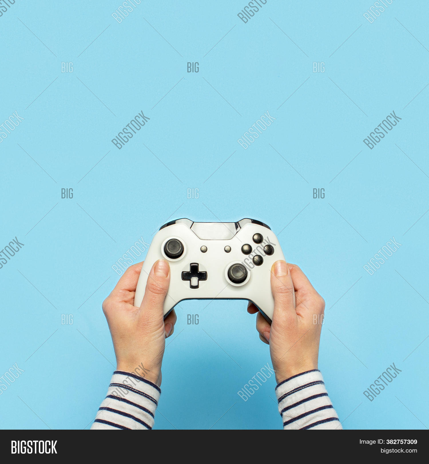 square, 																					gamepad, 																					hand, 																					controller, 																					fun, 																					game, 																					button, 																					console, 																					technology, 																					play, 																					remote, 																					gamer, 																					joystick, 																					entertainment, 																					hobby, 																					computer, 																					gaming, 																					pad, 																					equipment, 																					control, 																					handle, 																					joypad, 																					device, 																					female, 																					activity, 																					isolated, 																					toy, 																					one, 																					keypad, 																					holding, 																					simulator, 																					wireless, 																					man, 																					arm, 																					analog, 																					white, 																					background, 																					concept, 																					video, 																					player, 																					gadget, 																					simulation, 																					gambling, 																					competition, 																					stick, 																					using, 																					recreation