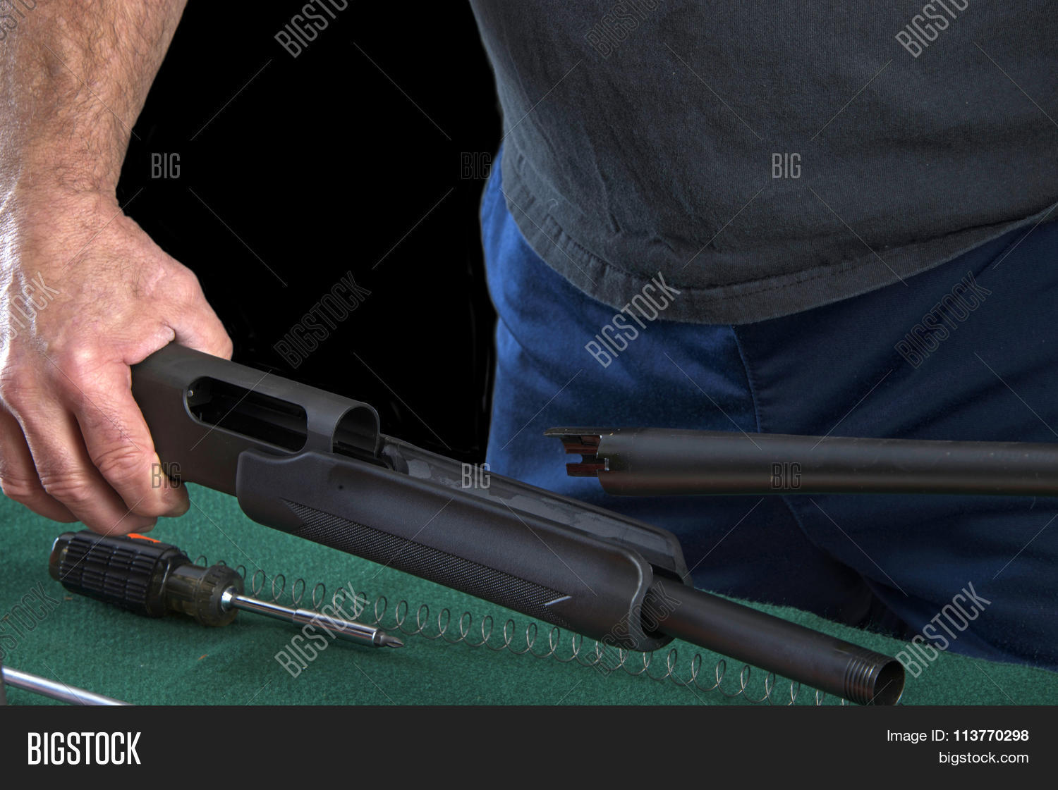 ammunition,antique,background,barrel,barreled,black,brown,caution,cleaning,dangerous,dark,design,disassemble,double,gun,hunter,hunting,instructor,life,man,objects,parts,preparation,professional,reassembling,riffle,rifle,safety,shooter,shot,shotgun,skin,smith,sport,steel,still,teaching,weapon