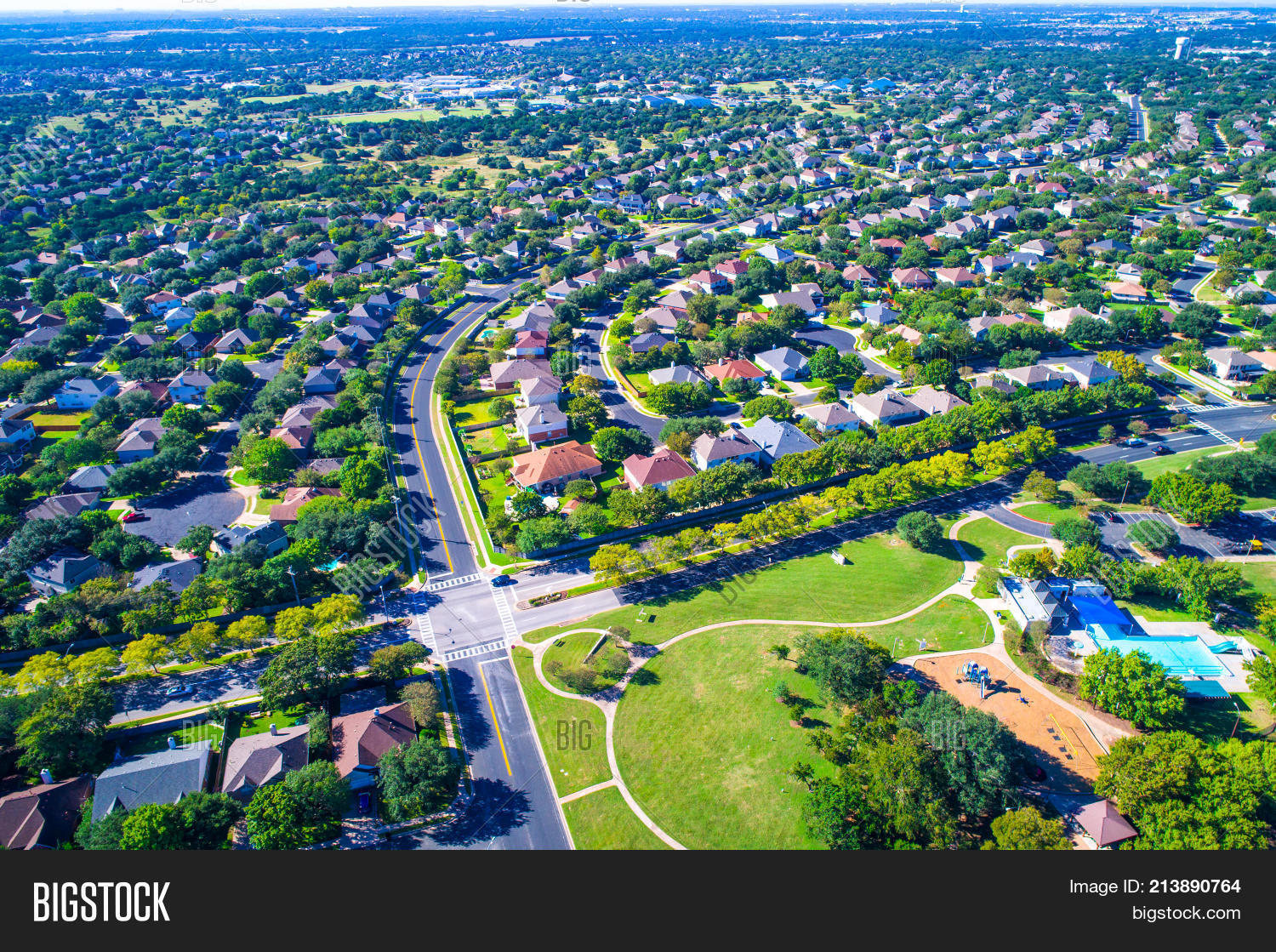 Development,Estate,Real,Rock,Round,Suburb,Suburbia,Texas,USA,Vast,above,aerial,and,community,drone,high,homes,houses,in,landscape,living,modern,neighborhood,of,perfect,summer,view