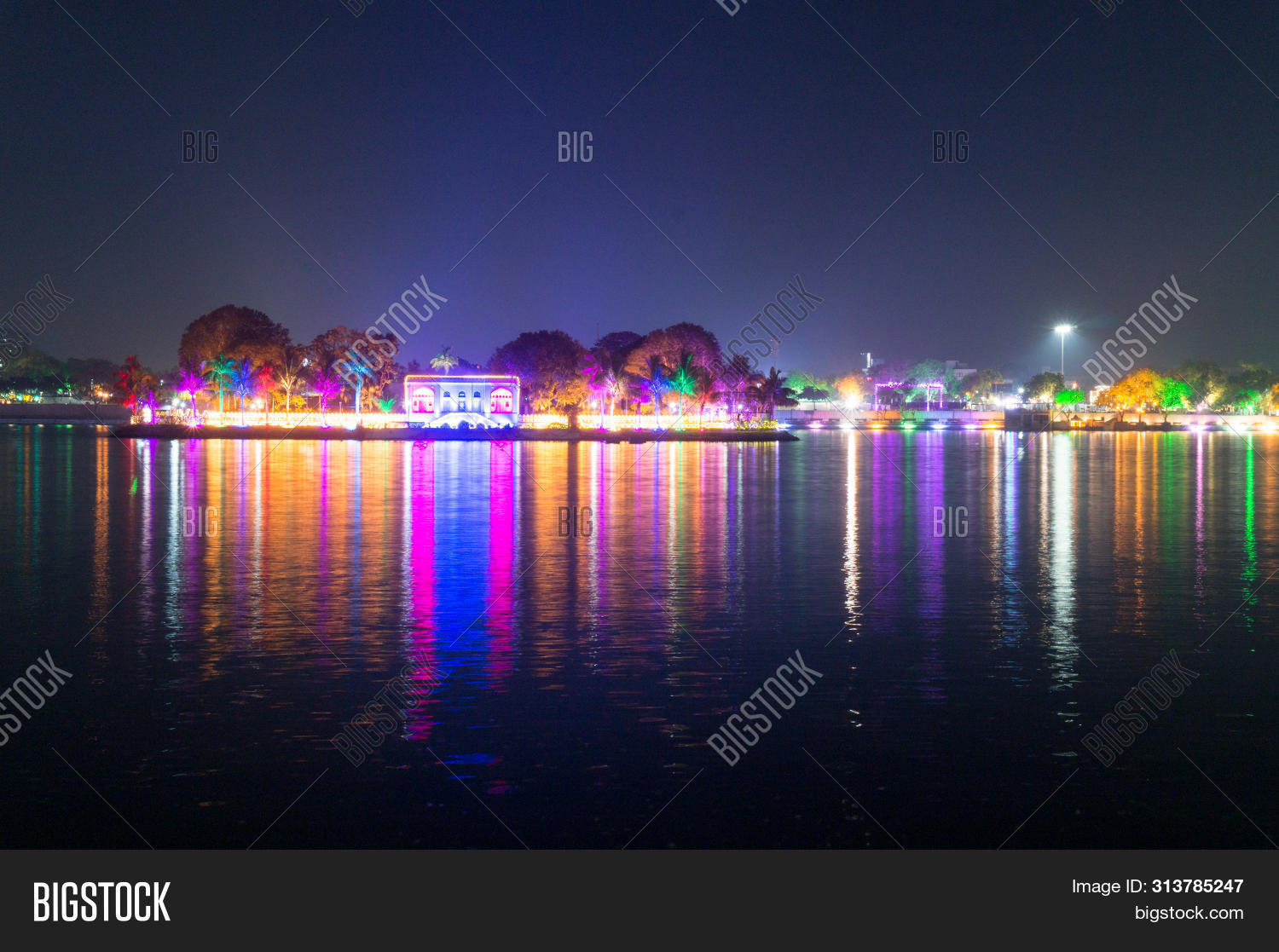 Landscape,active,ahmedabad,amusement,asia,asian,boat,boating,children,colorful,colour,decoration,entertainment,expression,family,fun,gujarat,hangout,horizontal,india,kankaria,lake,lights,men,monument,night,park,reflection,relax,sightseeing,travel,water,women