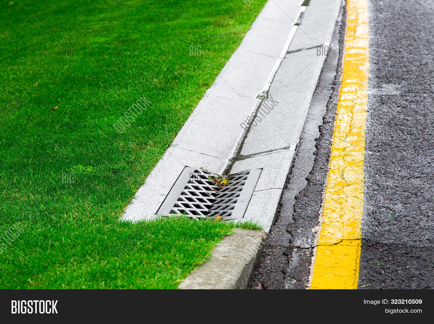asphalt,canal,channel,closeup,concrete,construction,current,ditch,drain,drainage,eco,engineering,footpath,grass,grate,green,gully,gutter,highway,industrial,landscape,line,manhole,marking,markup,nobody,outdoors,park,pathway,perspective,rain,rainwater,road,roadside,roadway,runoff,sewage,sewer,side,sidewalk,stock,stone,storm,surface,water,waterway,way,weather,wet,yellow