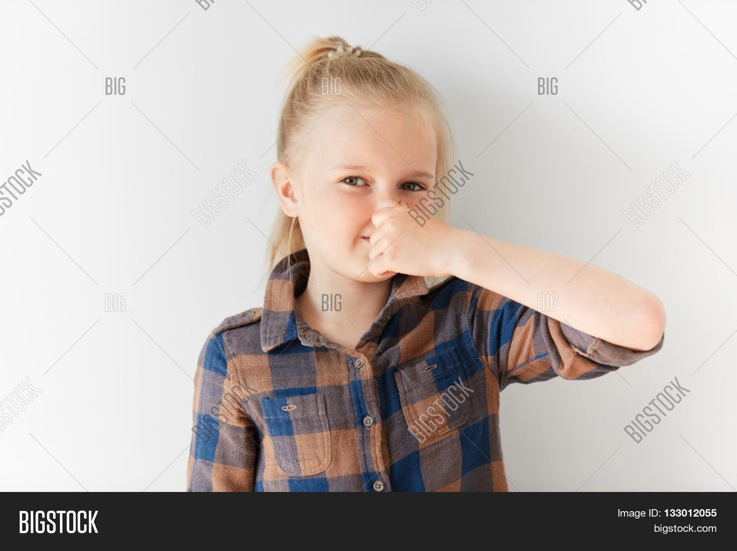 kid,girl,smell,nose,stink,child,face,stench,white,studio,female,cute,small,young,disgust,little,hand,isolated,caucasian,unpleasant,dislike,one,background,odor,stinky,gross,smelly,expression,disgusting,people,hold,portrait,adorable,person,adolescence,amuse,aversion,beautiful,block,childish,close,cover,displeased,feel,fetid,girlie,girlish,hair,indoor,preschool