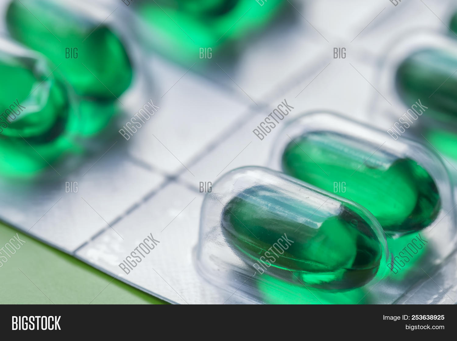 acting,antibiotic,background,blister,blue,capsule,care,close,closeup,color,concept,cure,dosage,dose,drug,fast,gel,gelatin,green,health,healthy,help,hospital,ibuprofen,illness,isolated,macro,medical,medication,medicine,nsaids,object,oil,overdose,pack,package,packaging,pain,painkiller,pharmaceutical,pharmacy,pill,prescription,remedy,soft,strip,tablet,treatment,up,vitamin
