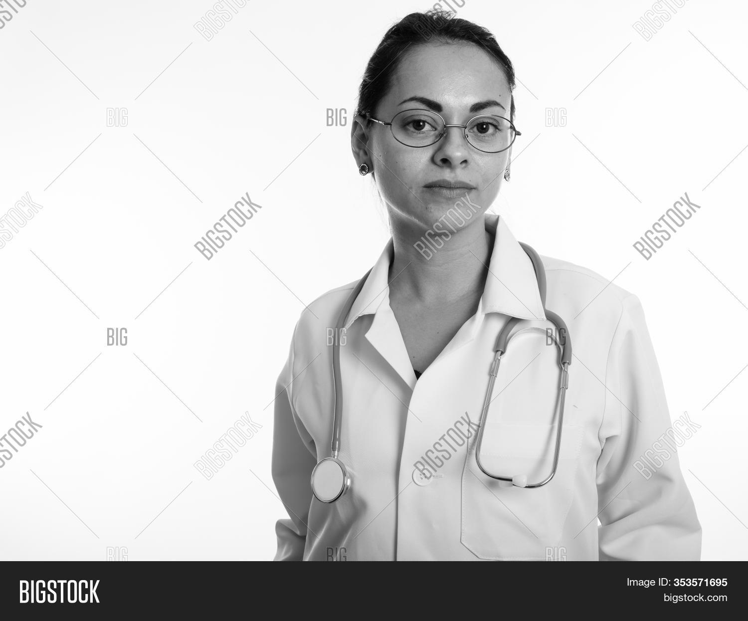 30s, 																					adult, 																					attractive, 																					background, 																					beautiful, 																					care, 																					close, 																					coat, 																					doctor, 																					eyeglasses, 																					face, 																					glasses, 																					health, 																					lab, 																					lady, 																					looking, 																					medical, 																					people, 																					person, 																					physician, 																					portrait, 																					stethoscope, 																					studio, 																					uniform, 																					up, 																					white, 																					woman