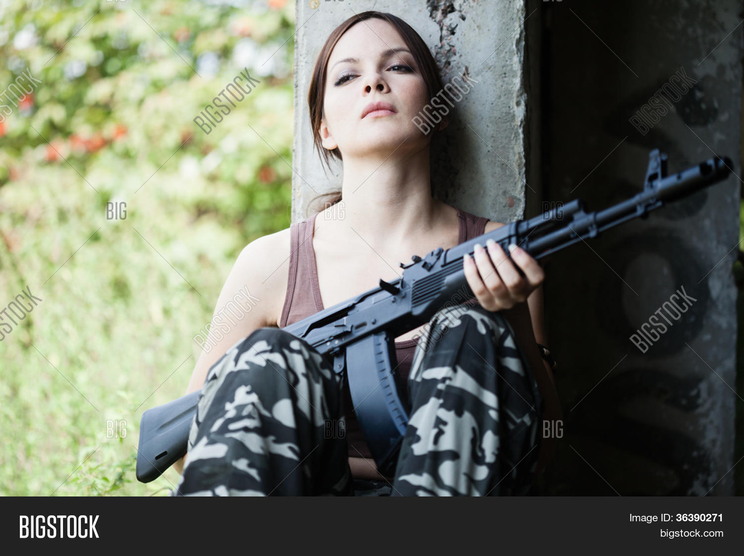 adult,aggression,ak-47,ak-74,akm,armed,army,beautiful,beauty,black,brown,camouflage,caucasian,clothing,conflict,danger,fashion,female,forces,glamour,guard,gun,hair,human,kalashnokov,military,model,one,pants,patriotism,people,person,rebellion,relax,rest,rifle,security,sensuality,shooting,sitting,sniper,violence,war,warrior,weapon,white,woman,young