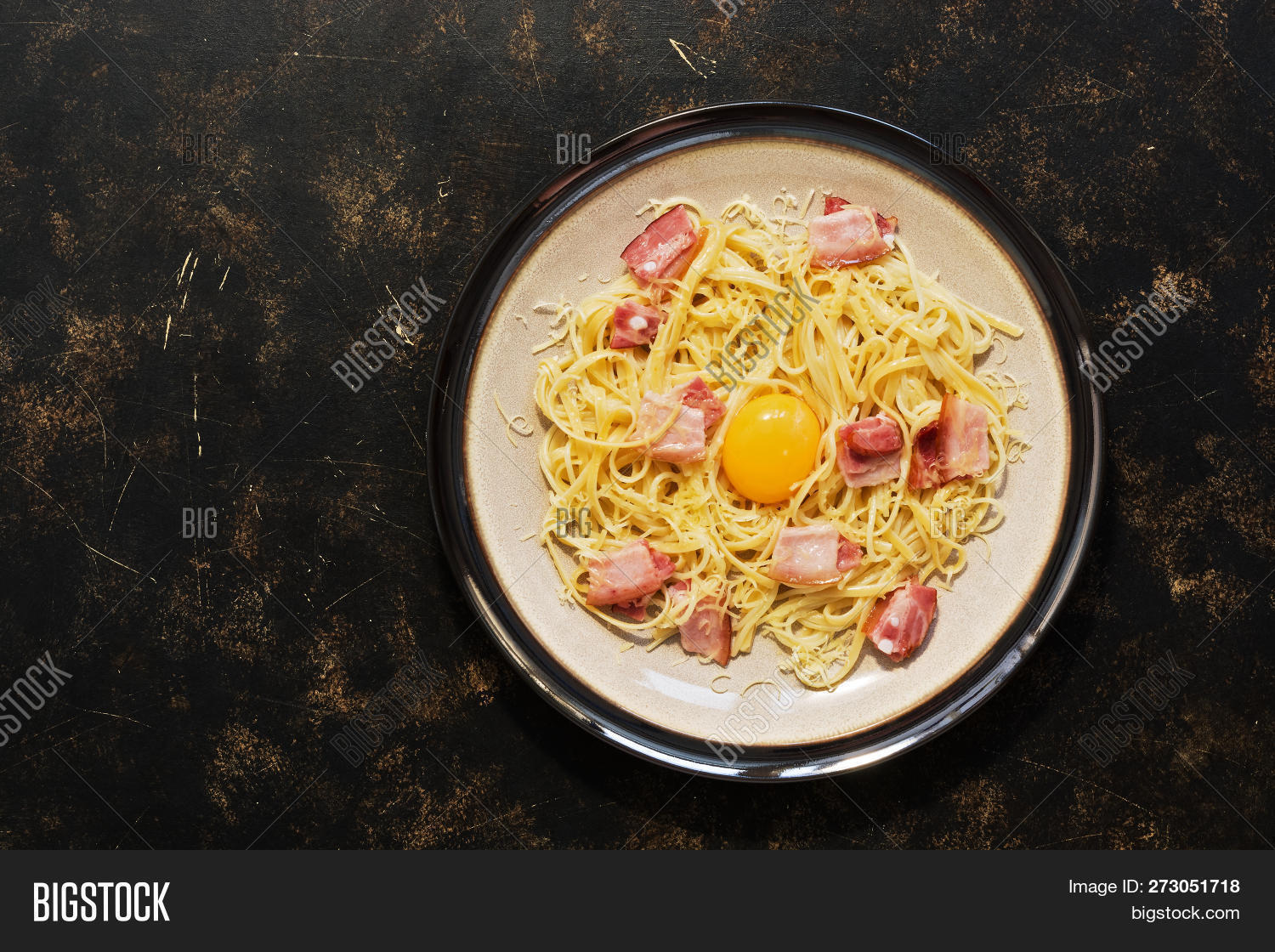 above,alla,appetizing,background,bacon,brown,carbonara,cheese,closeup,cooking,cream,creamy,cuisine,dark,dinner,dish,egg,food,fresh,gastronomy,gourmet,ham,homemade,horizontal,italian,italy,knife,lunch,meal,meat,mediterranean,noodles,nutrition,parmesan,pasta,pepper,plate,pork,recipe,restaurant,sauce,spaghetti,spice,tasty,traditional,wooden,yolk