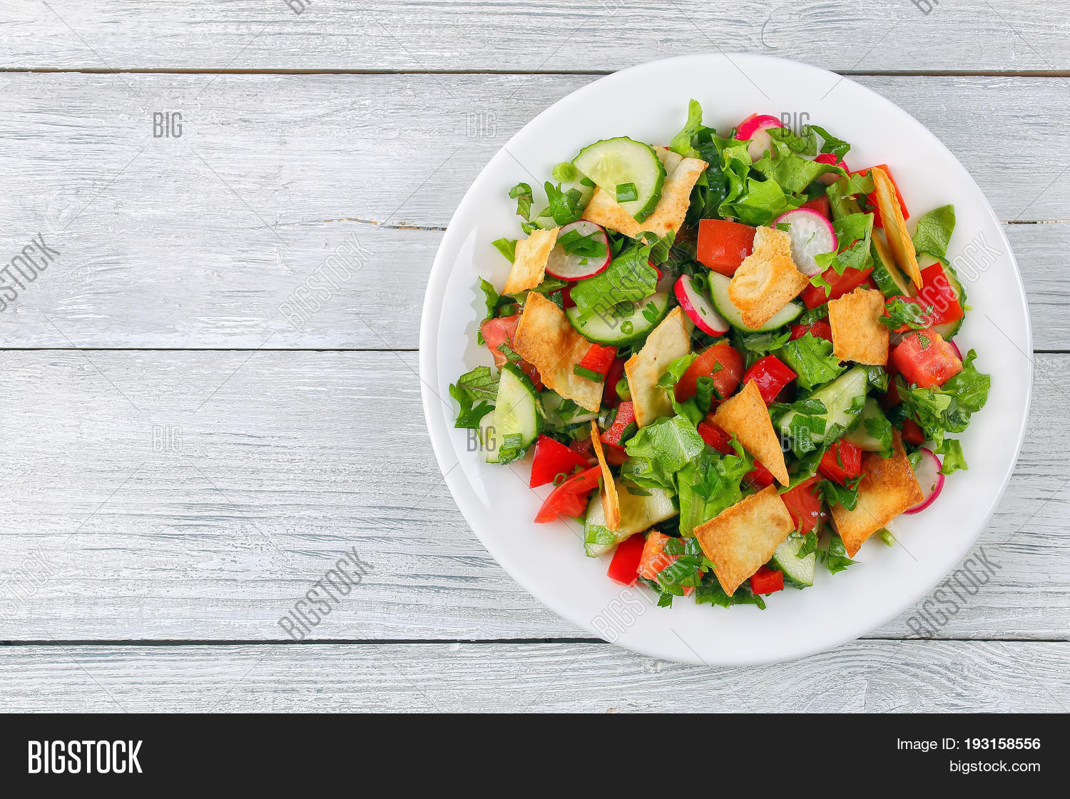 appetizer,appetizing,arabian,arabic,asian,authentic,bread,closeup,cooked,cucumber,cuisine,diet,eastern,easy,fatoush,fattouch,fattoush,fattush,food,healthy,herbs,juicy,lebanese,lettuce,mediterranean,mint,parsley,pepper,pita,plate,radish,recipes,restaurant,romaine,salad,sumac,syrian,table,tomato,top,traditional,turkish,vegetable,vegetarian,view,white,wooden