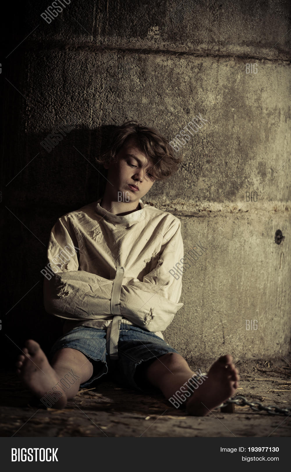 abuse,abused,alone,asleep,atmospheric,attic,barefoot,basement,boy,captive,child,concrete,confined,confinement,crime,darkness,floor,forlorn,hopelessness,hostage,immobilised,imprisoned,jacket,kid,kidnap,loneliness,mad,madness,mobility,person,prisoner,psychotic,shadows,sitting,solitary,straight,teenager,terrorism,victim,wall