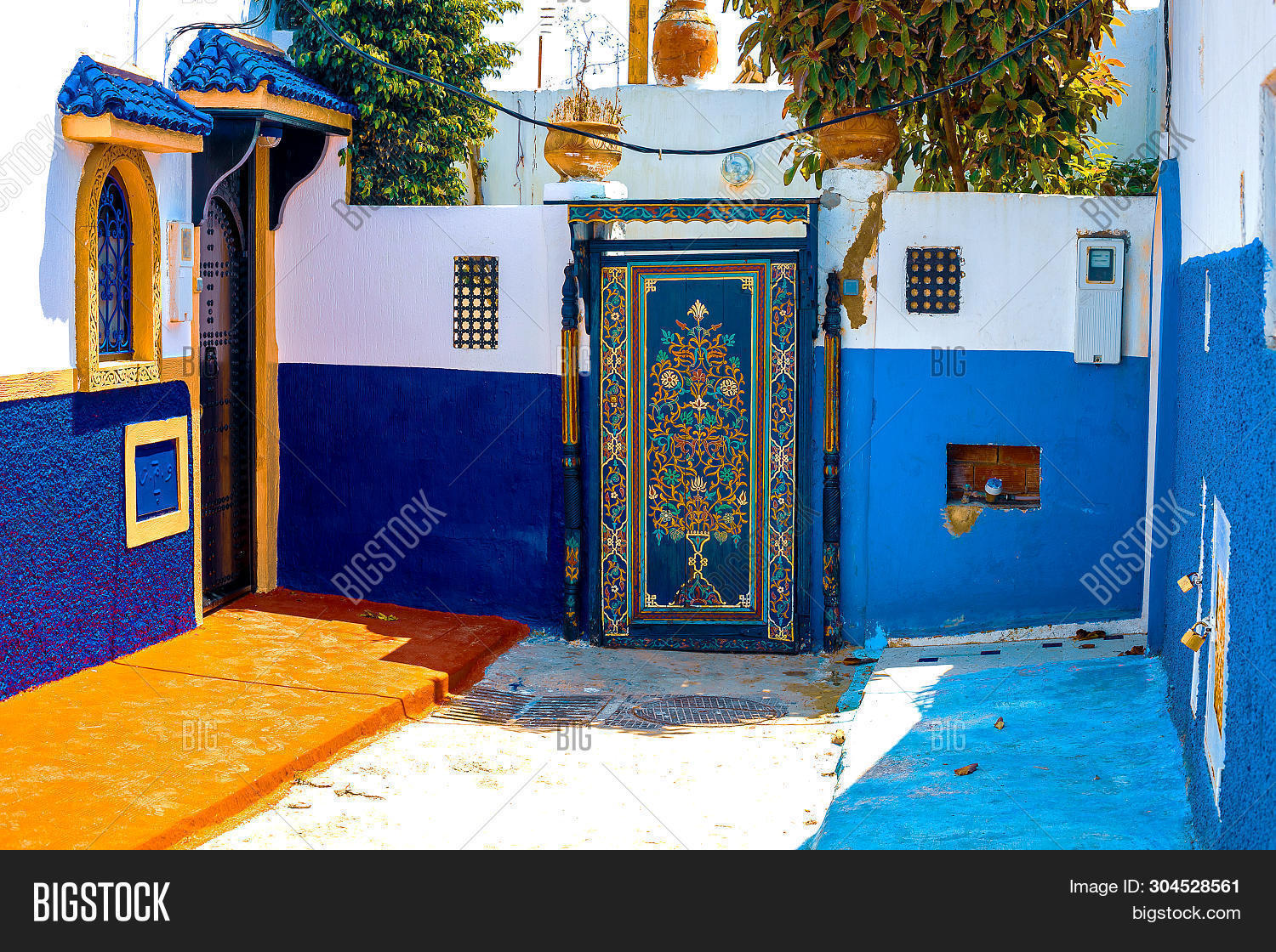 africa,alley,ancient,arabic,architecture,background,blue,building,capital,city,color,colorful,culture,day,door,east,famous,heritage,historic,house,islamic,kasbah,landmark,maghreb,medina,moroccan,morocco,narrow,nobody,old,plant,rabat,residential,road,shadow,street,summer,sunny,tourism,town,traditional,travel,tree,unesco,vacation,view,wall,white,windows