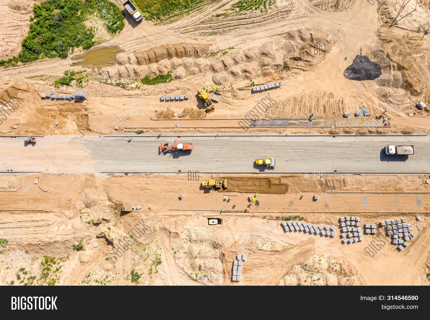 above,activity,aerial,background,bulldozer,compactor,construction,development,digger,drone,dump,earthmover,earthmoving,environment,equipment,excavation,excavator,flattening,grader,gravel,ground,heavy,hydraulic,industrial,industry,land,landscape,loader,machine,machinery,outdoor,panoramic,photography,preparation,road,roadwork,roller,sand,site,soil,summer,tractor,transportation,truck,view,work,yellow