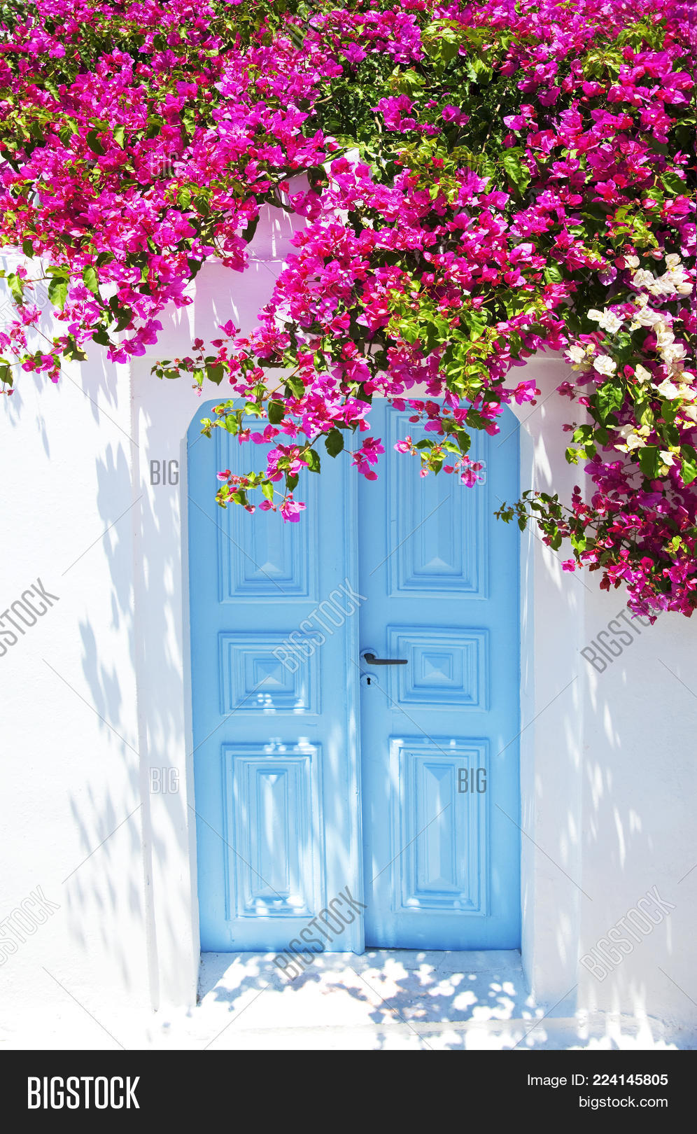 aegean,architecture,background,beautiful,beauty,blue,bouganvilea,building,caldera,city,culture,cyclades,day,door,europe,flower,greece,greek,holiday,house,inspirational,island,landmark,landscape,mauve,mountain,nature,oia,outdoors,pink,resort,romantic,santorini,sea,sky,spring,style,summer,sunny,tourism,town,traditional,travel,vacation,view,village,volcano,water,white