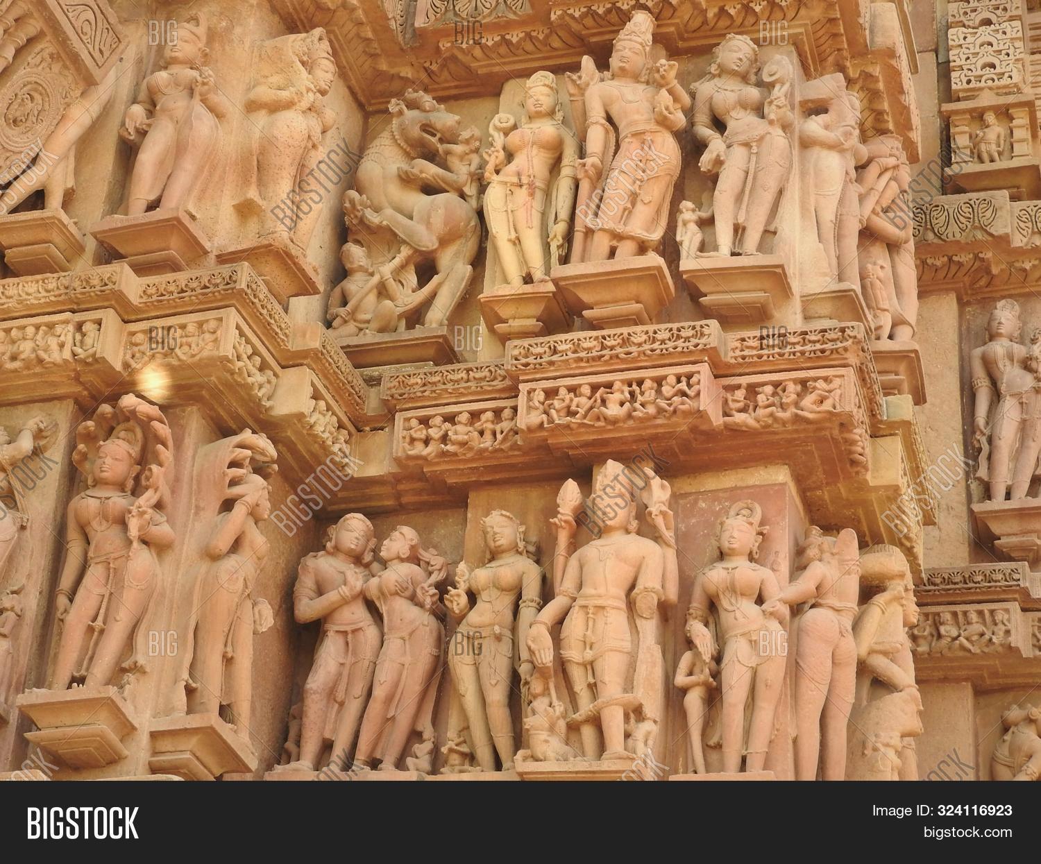 act,ancient,architectural,architecture,art,asia,attraction,building,carving,chitragupta,couples,cultural,culture,destination,erotic,exterior,heritage,hindu,hinduism,historic,india,indian,kamasutra,kandariya,khajuraho,love,madhya,mahadev,mahadeva,old,outside,place,pradesh,religion,religious,sculpture,sexual,sexy,shiva,site,statue,stone,temple,tourism,tourist,travel,unesco,wall,worship