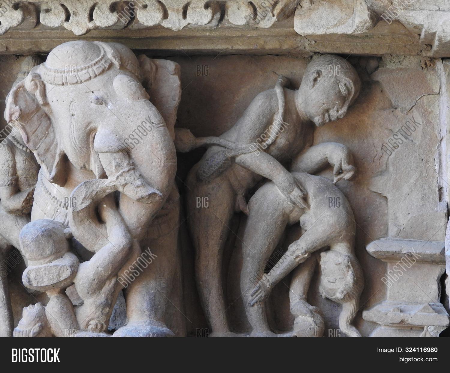 act,ancient,architectural,architecture,art,asia,attraction,building,carving,chitragupta,couples,cultural,culture,destination,erotic,exterior,heritage,hindu,hinduism,historic,india,indian,kamasutra,kandariya,khajuraho,love,madhya,mahadev,mahadeva,old,outside,place,pradesh,religion,religious,sculpture,sexy,shiva,site,statue,stone,temple,tourism,tourist,travel,unesco,wall,worship