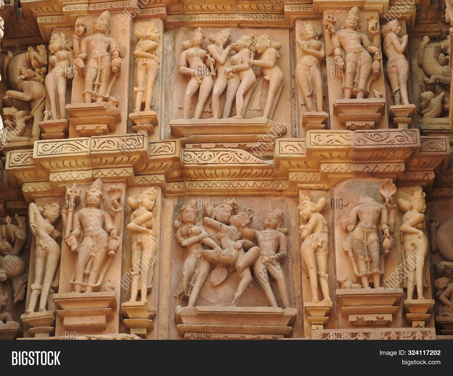 act,ancient,architectural,architecture,art,asia,attraction,building,carving,chitragupta,couples,cultural,culture,destination,erotic,exterior,heritage,hindu,hinduism,historic,india,indian,kamasutra,kandariya,khajuraho,love,madhya,mahadev,mahadeva,old,outside,place,pradesh,religion,religious,sculpture,sexy,shiva,site,statue,stone,temple,tourism,tourist,travel,unesco,wall,worship