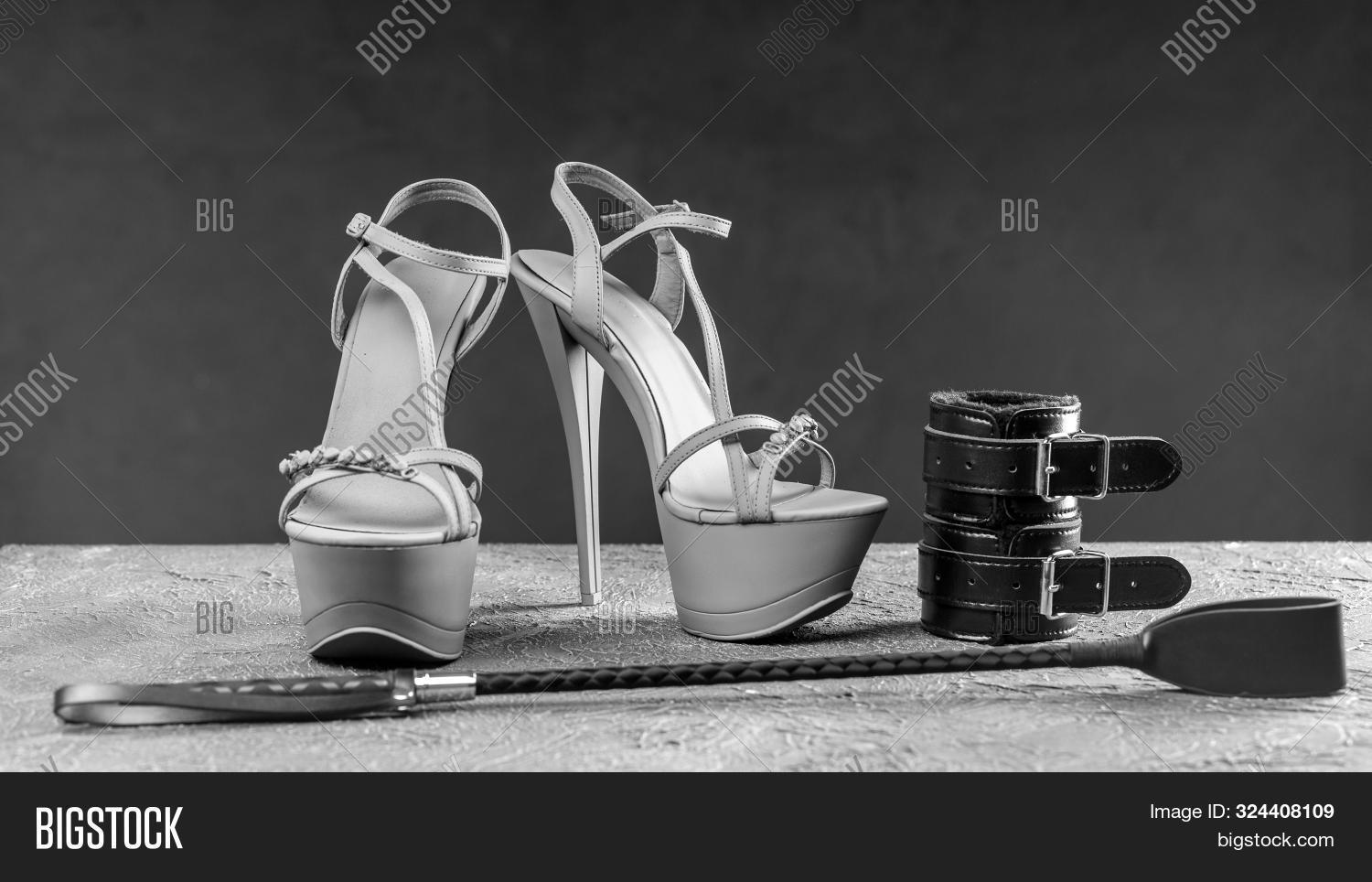 accessories,adult,background,bdsm,beautiful,black,bondage,bullwhip,burlesque,criminal,cuffs,design,dominatrix,equipment,erotic,fashion,female,fetish,flogger,girl,handcuff,heels,hot,isolated,kinky,latex,leather,legs,masochism,master,mistress,outfit,red,riding,sadism,sadist,sadomasochism,sexy,shoes,slave,stiletto,toy,up,whip,woman