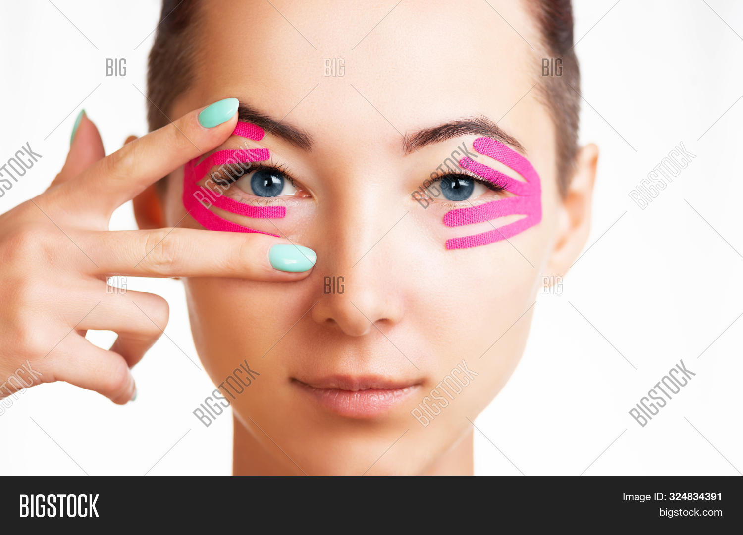 adult,anti-aging,applique,beautiful,beauty,care,caucasian,cosmetology,eye,eyelid,face,facelift,female,front,girl,hand,health,kinesio,kinesiology,medicine,one,pink,portrait,procedure,skin,smiling,tape,treatment,view,wellness,woman,wrinkle,young