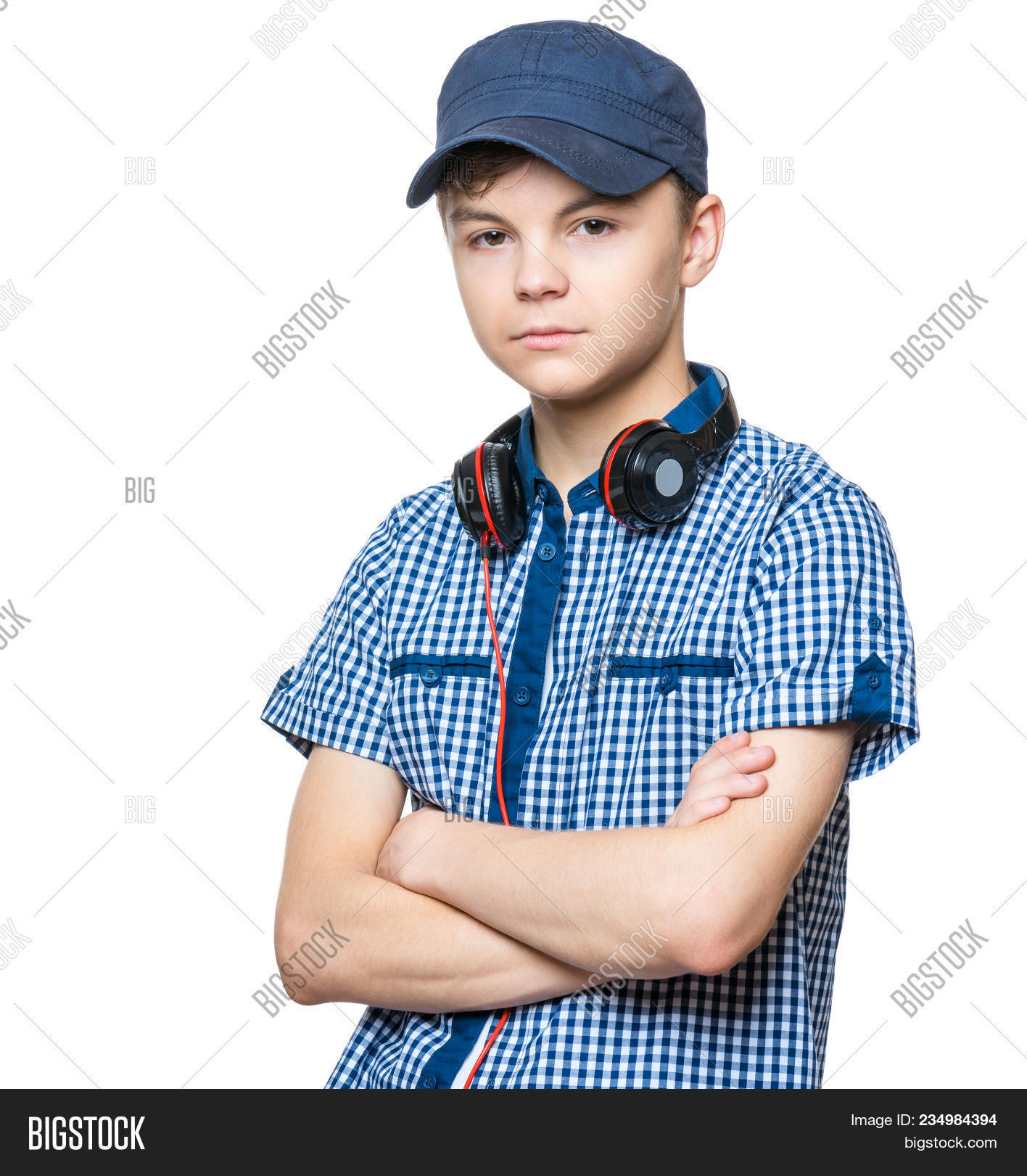14-16,adolescent,attractive,background,boy,cap,casual,childhood,children,confident,cool,crossed,cute,earphones,enjoy,enjoyment,fresh,fun,funny,growth,guy,hand,handsome,happiness,happy,hat,headphones,human,isolated,joy,listen,male,man,modern,music,old,people,person,portrait,smiling,standing,student,studio,teenage,teenager,white,year,young,youth