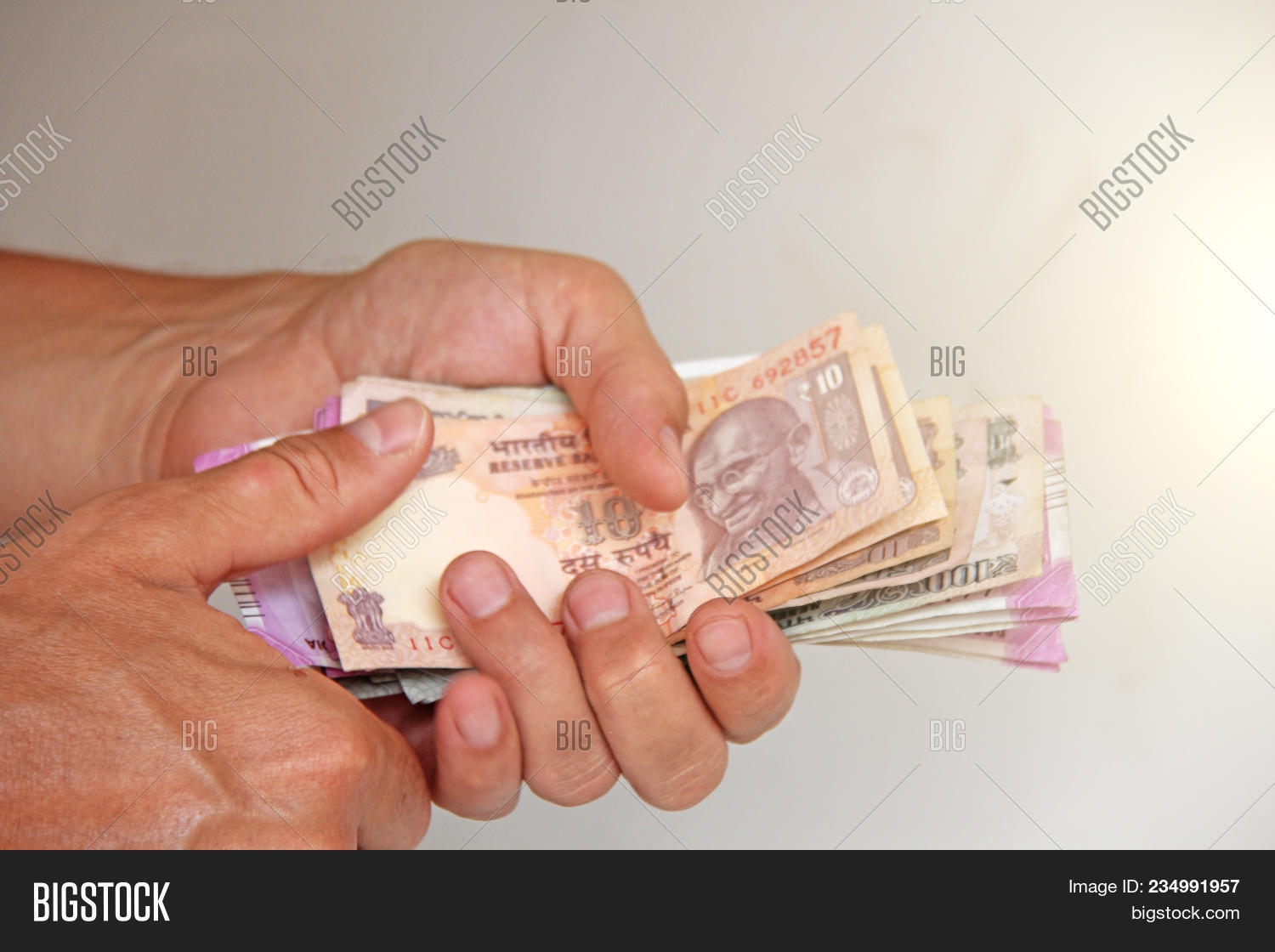 100,2000,500,Gandhi,Mahatma,background,banknote,business,cash,concept,considers,currency,economy,exchange,finance,financial,foreign,give,group,hands,human,hundred,in,india,indian,inr,investing,investment,large,loan,many,money,new,note,offer,paper,pay,purple,recalculate,rupees,savings,sign,spend,the,thousands,two,wealth