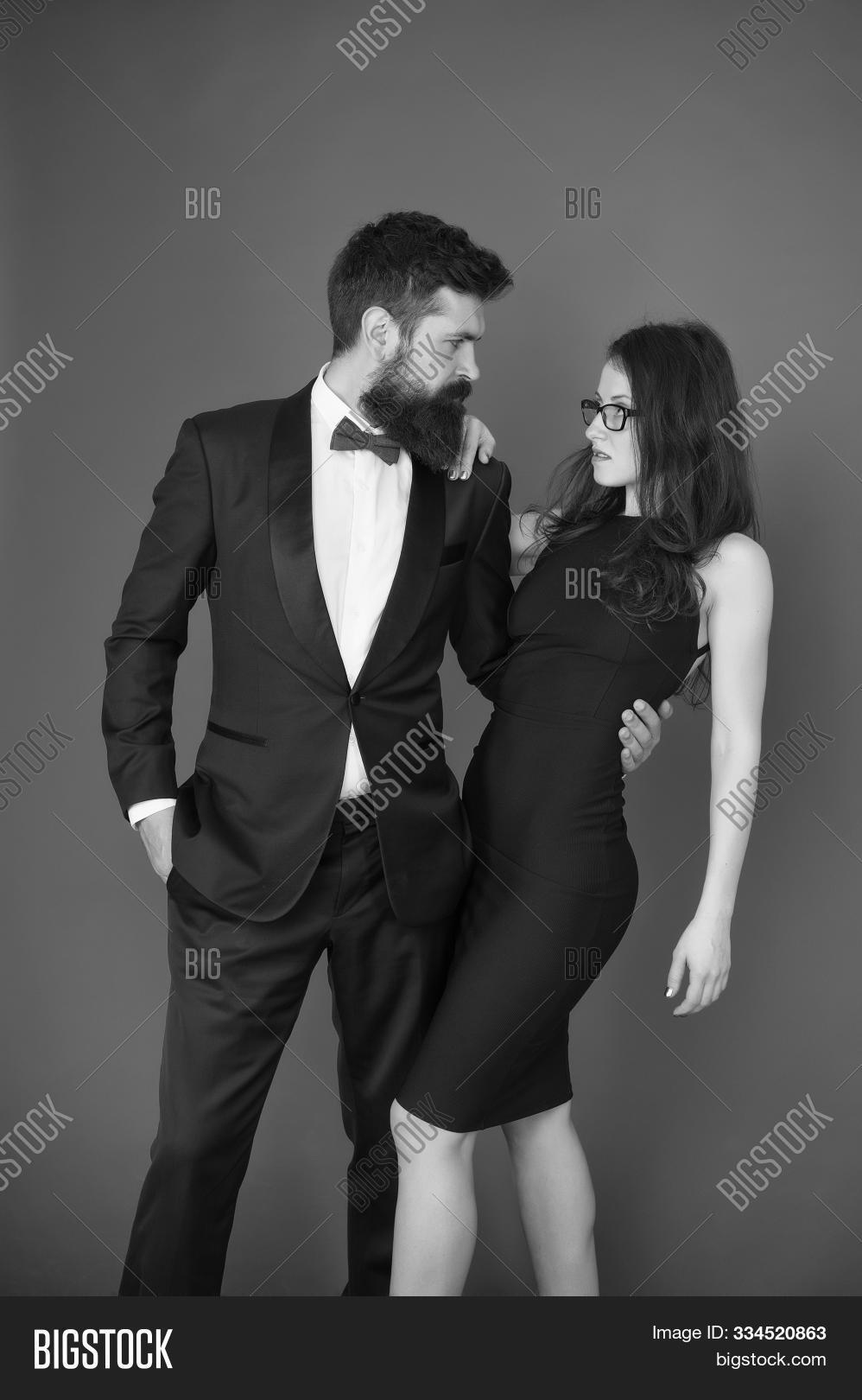 accessory,art,auctioneer,bearded,black,boss,bow,business,celebration,clothing,collar,couple,date,director,dress,engaged,engagement,esthete,evening,experts,fashion,formal,gentlemen,gown,hipster,invitation,jacker,love,lover,man,meeting,men,necktie,outfit,promoter,red,relationship,romantic,romantically,sexy,stylish,suit,tie,trust,tux,wife,woman