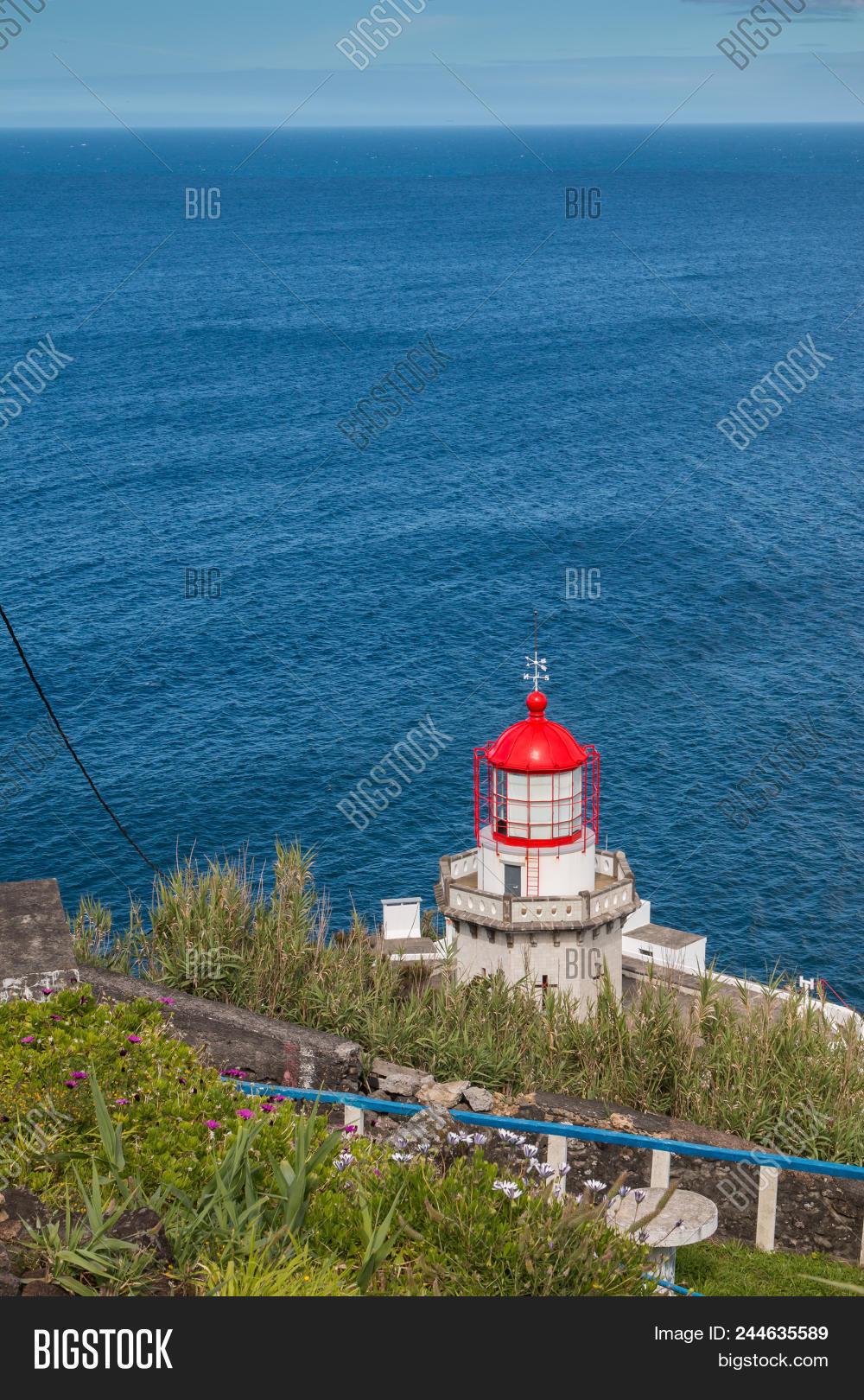 Architecture,Arnel,Azores,Miguel,Portugal,Sao,aid,atlantic,blue,boat,building,cliff,coast,coastline,europe,harbor,hill,house,island,landscape,light,lighthouse,mountain,nature,navigation,nordeste,ocean,portuguese,red,rocks,scenery,scenic,sea,shore,signal,sky,tower,transportation,travel,traveler,trip,water,wave