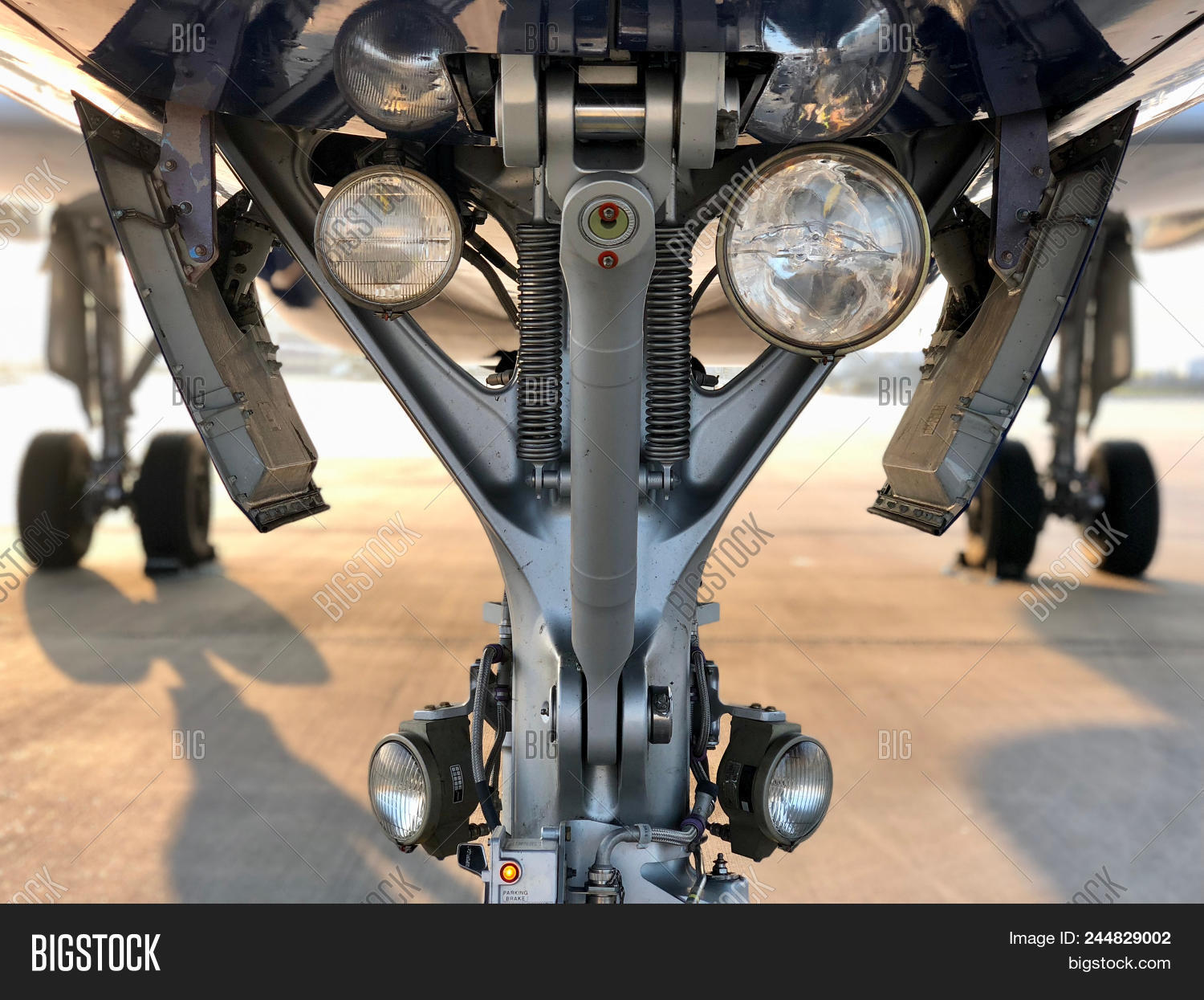 afternoon,airbus,airbus a320,airline,airport,aluminium,apron,arrival,black,bulb,chocks,closeup,commercial,dawn,day,detail,door,engine,engineering,hydraulic,industrial,industry,jet,jet aircraft,jet airplane,jet plane,light,lights,machine,metal,plane,reflection,shadow,spring,steel,sunset,tarmac,transport,transportation,travel,tyre,vehicle,wheel
