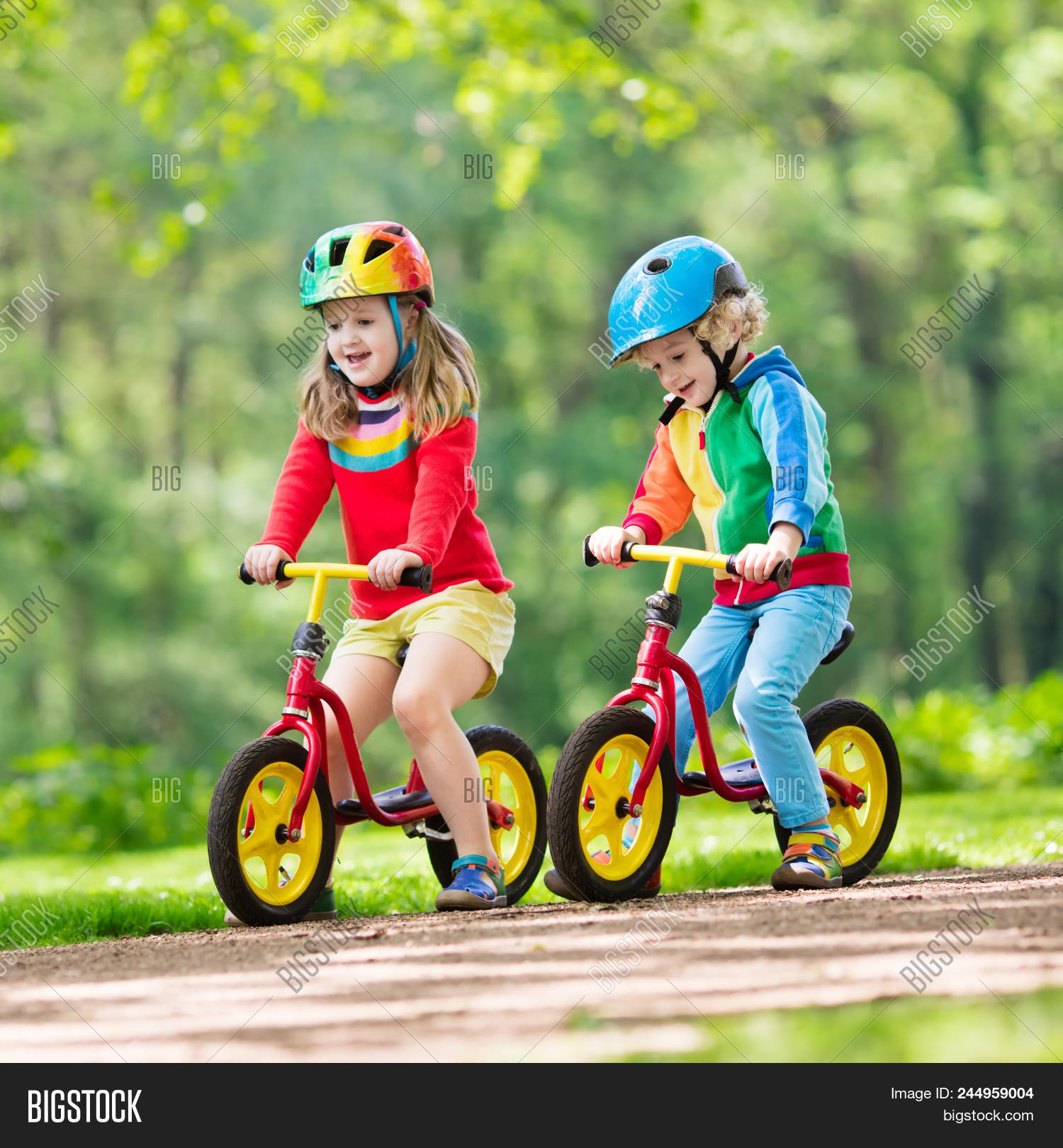small boy driving bike