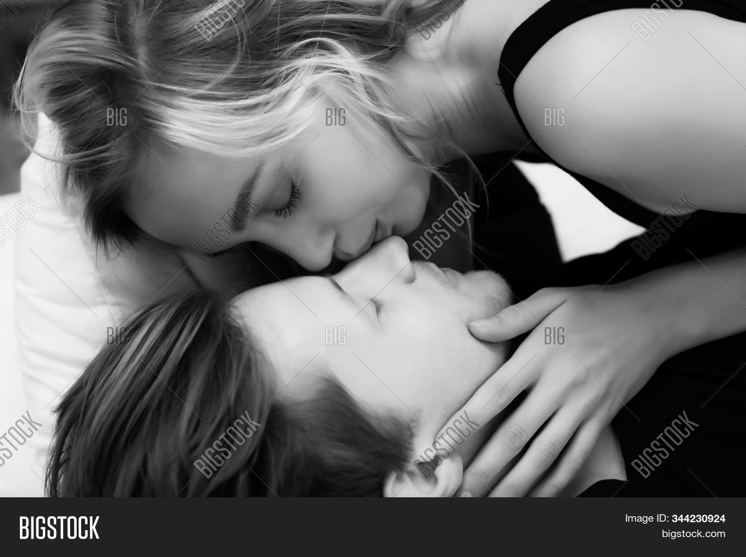 affection,affectionate,amorous,attractive,beautiful,beauty,bed,bedroom,black,white,blond,boyfriend,caressing,caucasian,closeness,couple,cuddle,cuddling,embrace,female,girl,girlfriend,handsome,happiness,happy,hugging,husband,intimacy,intimate,kiss,love,lover,lying,man,marriage,married,passion,people,portrait,relationship,romance,romantic,smile,together,touching,wife,woman,young