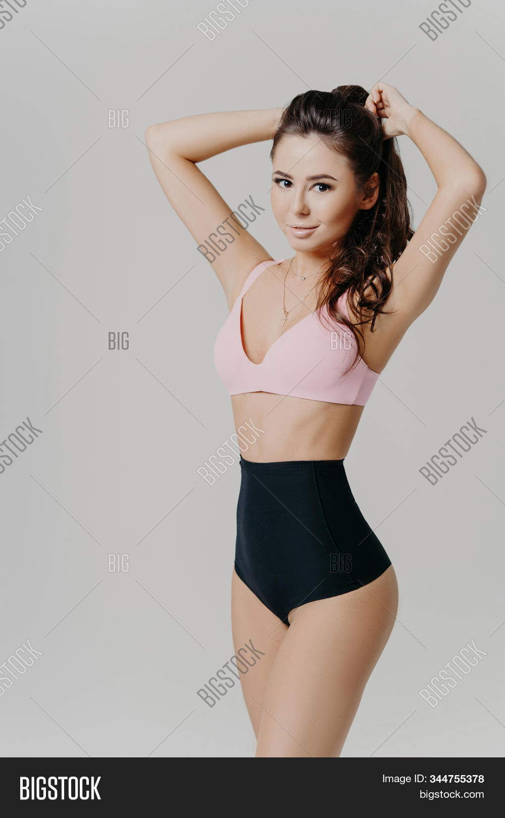 bra,underwear,young,pants,panties,lingerie,legs,lady,fit,slim,caucasian,female,beautiful,body,woman,beauty,sexy,face,waist,white,background,erotic,girl,hips,isolated,sporty,summer,thin,adult,figure,model,brunette,makeup,grey,vertical,standing,posing,shot,human,individual,healthy,european,caucasin,modeling,ponytail,studio,appearance,personality,chain