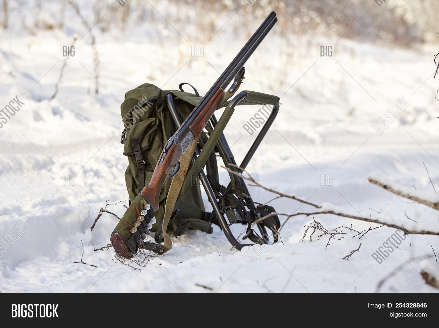 aim,ammunition,animal,background,backpack,caliber,camouflage,concentration,double,equipment,field,forest,frost,gun,hunt,hunter,hunting,knapsack,male,man,men,nature,outdoor,recreation,retriever,rifle,rucksack,scene,season,shoot,shot,shotgun,snow,sport,weapon,wild,wildlife,winter
